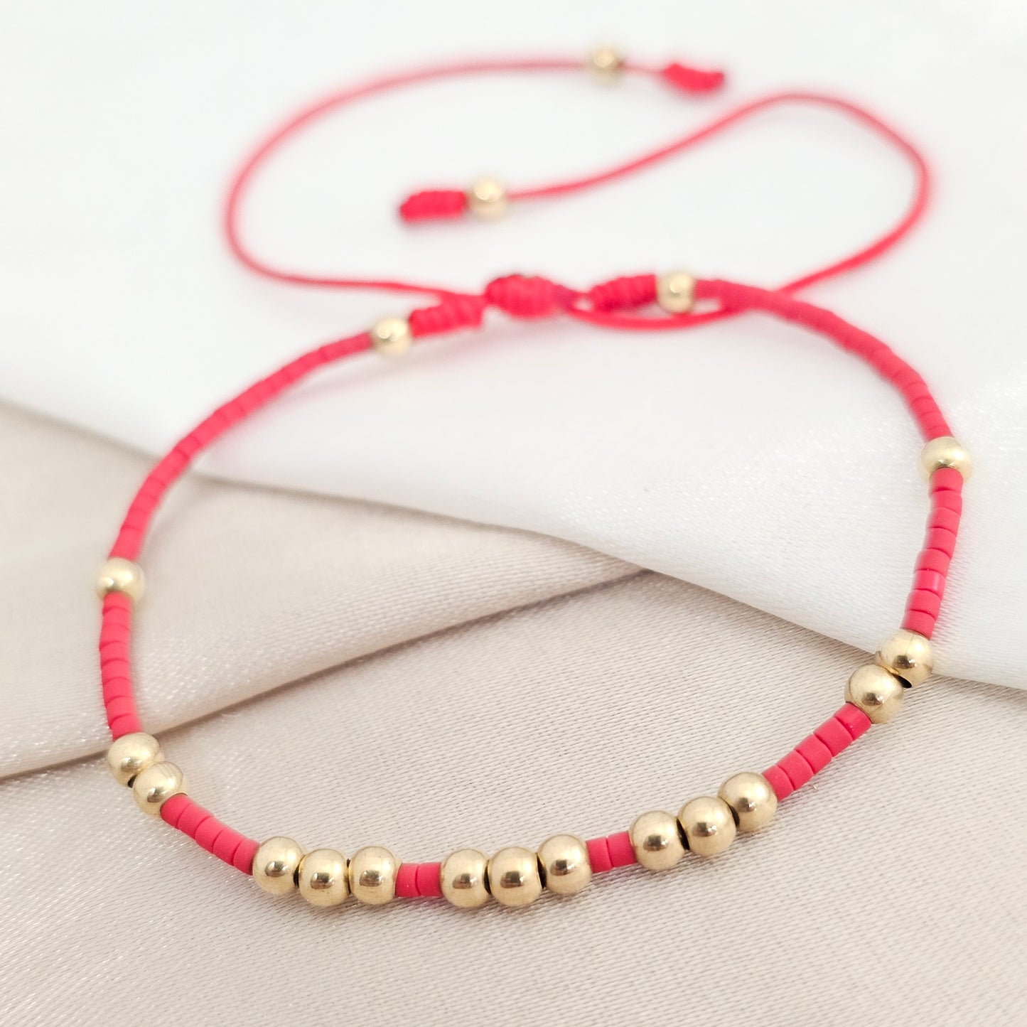 PULSERA GOLD # 3 MIYUKI 19 BALINES ROJA