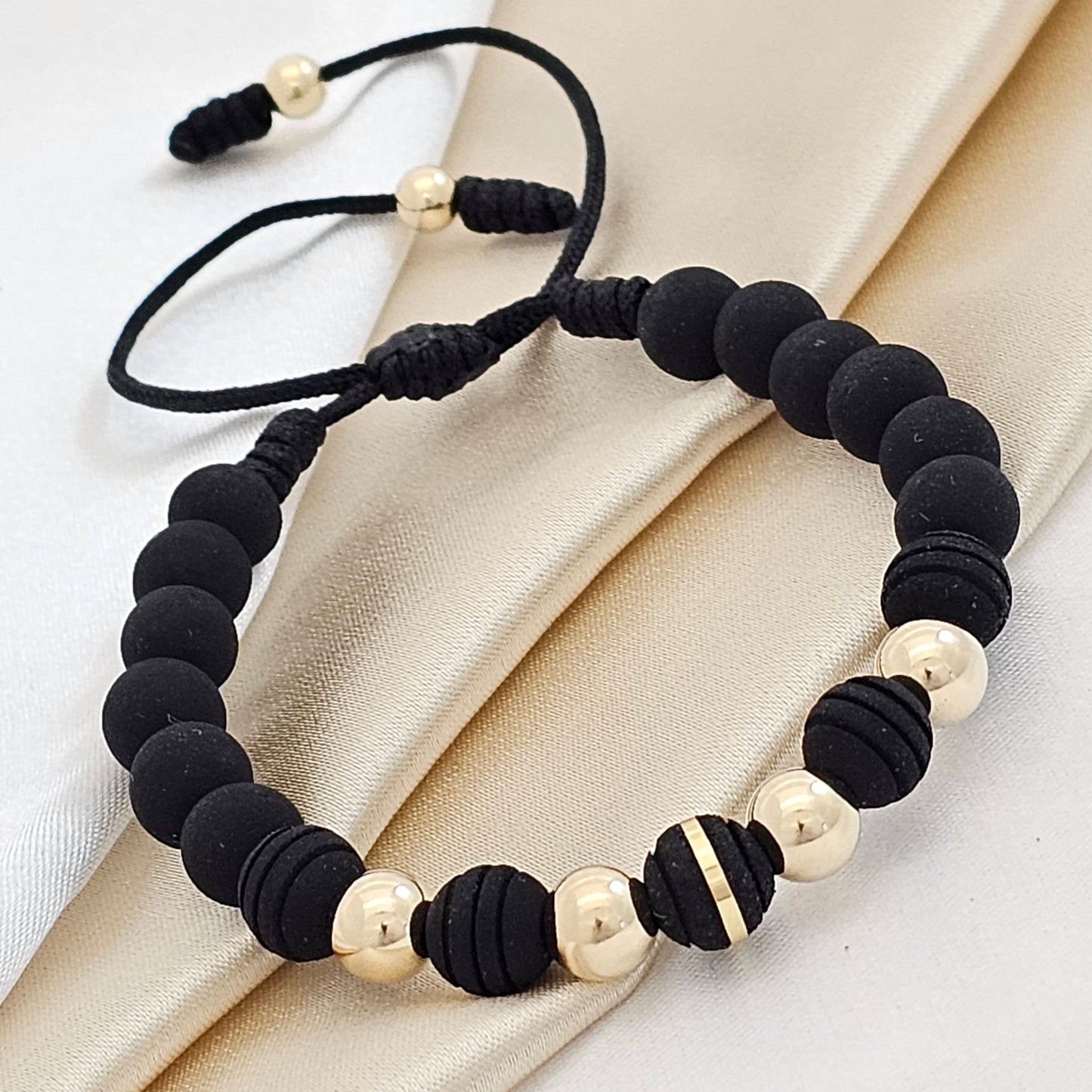 PULSERA GOLD # 7 NEOPRE LISO Y RANURADO # 8 NEGRO