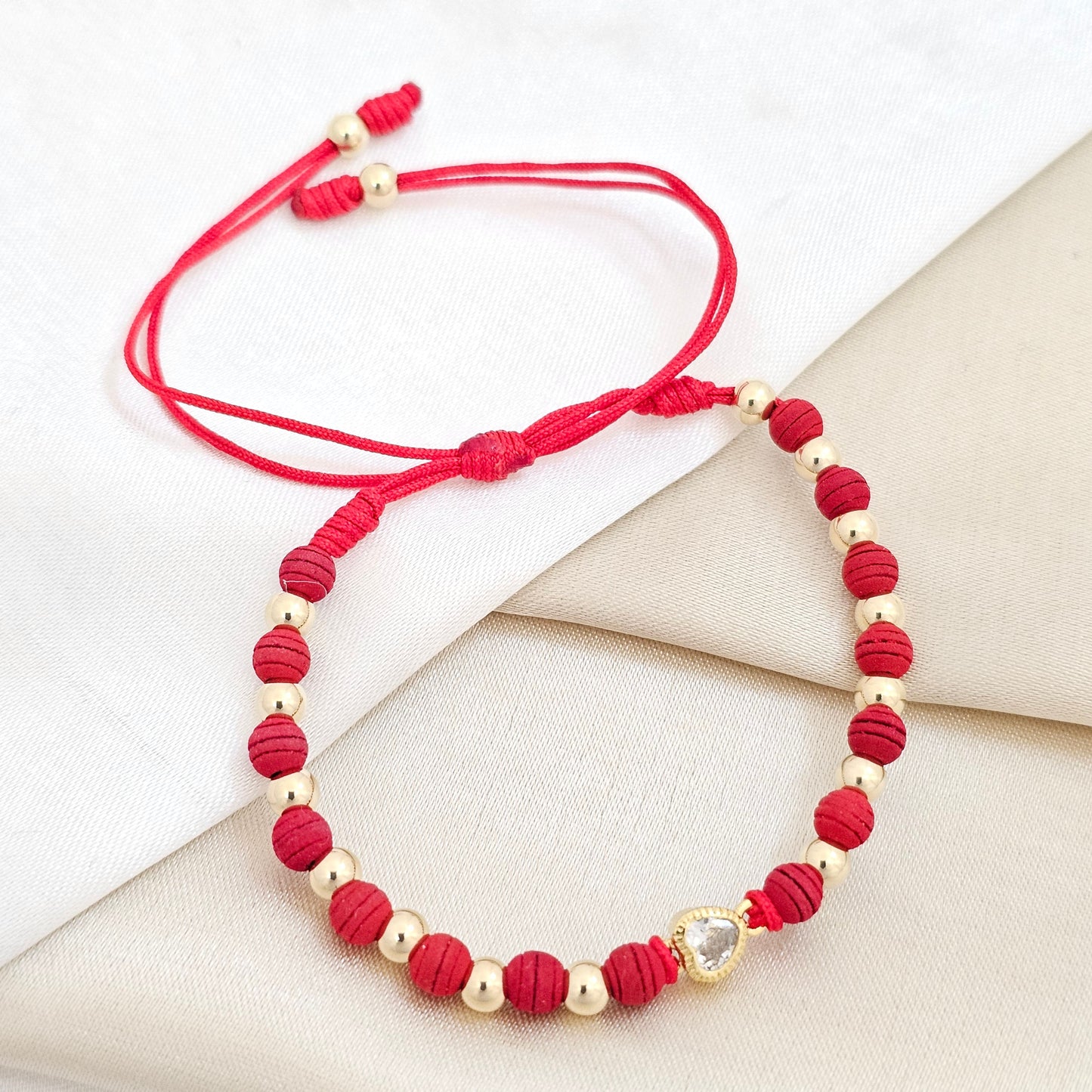 PULSERA GOLD HERRAJE CORAZON MINI # 4 ROJA