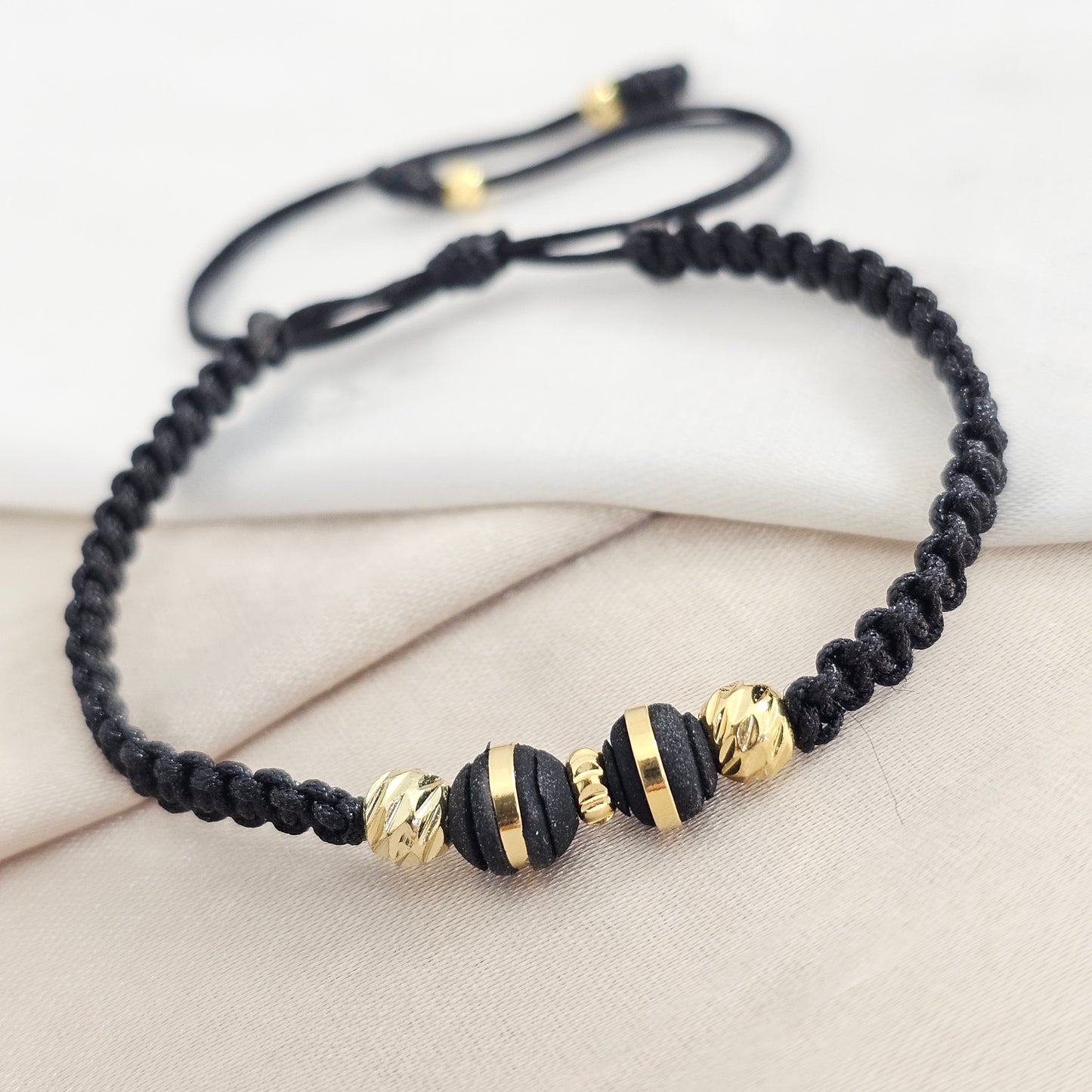 PULSERA GOLD NEOPRENO / H REDONDO NEGRA