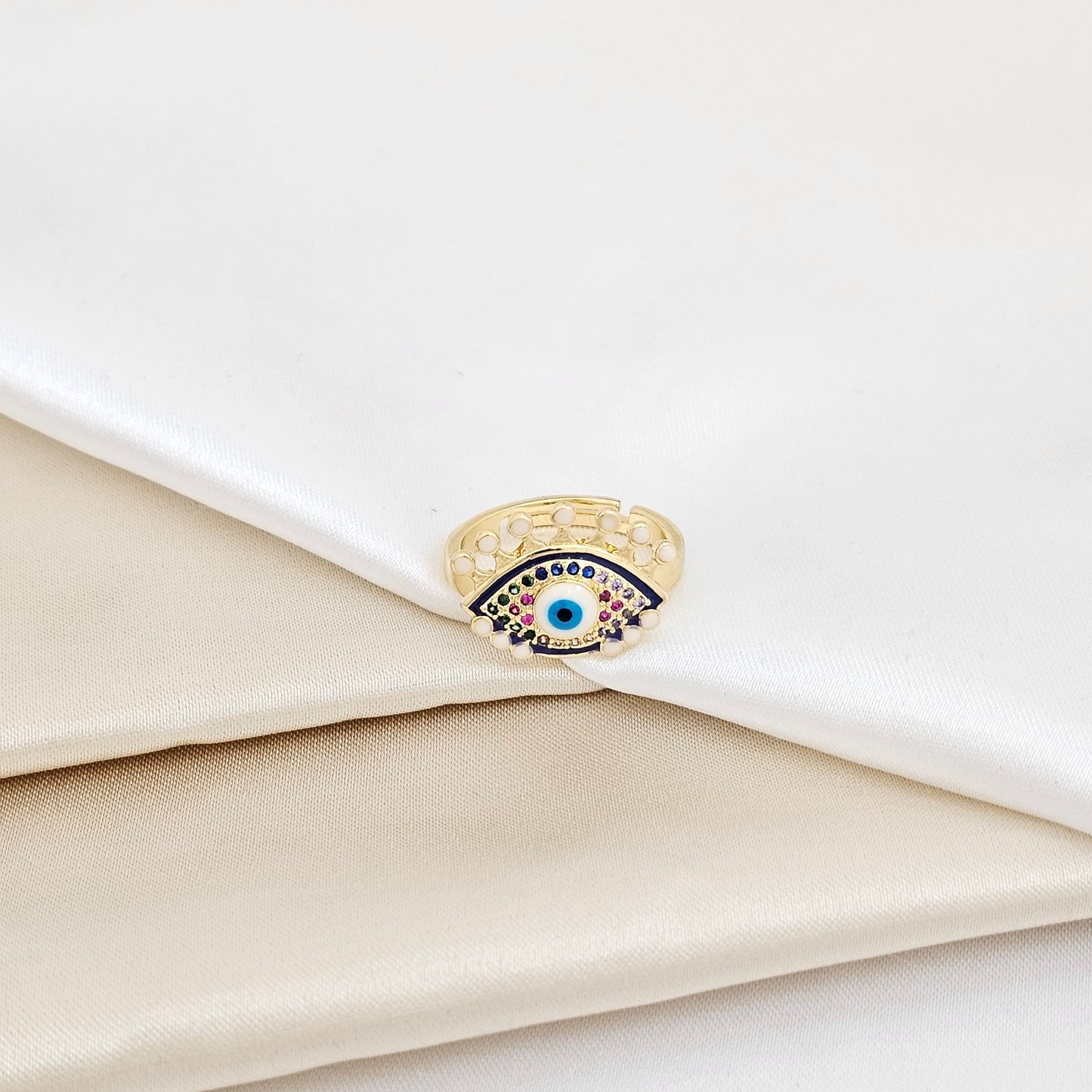 ANILLO DORADO CON OJO BLANCO CIRCONES DE COLORES RF K5651