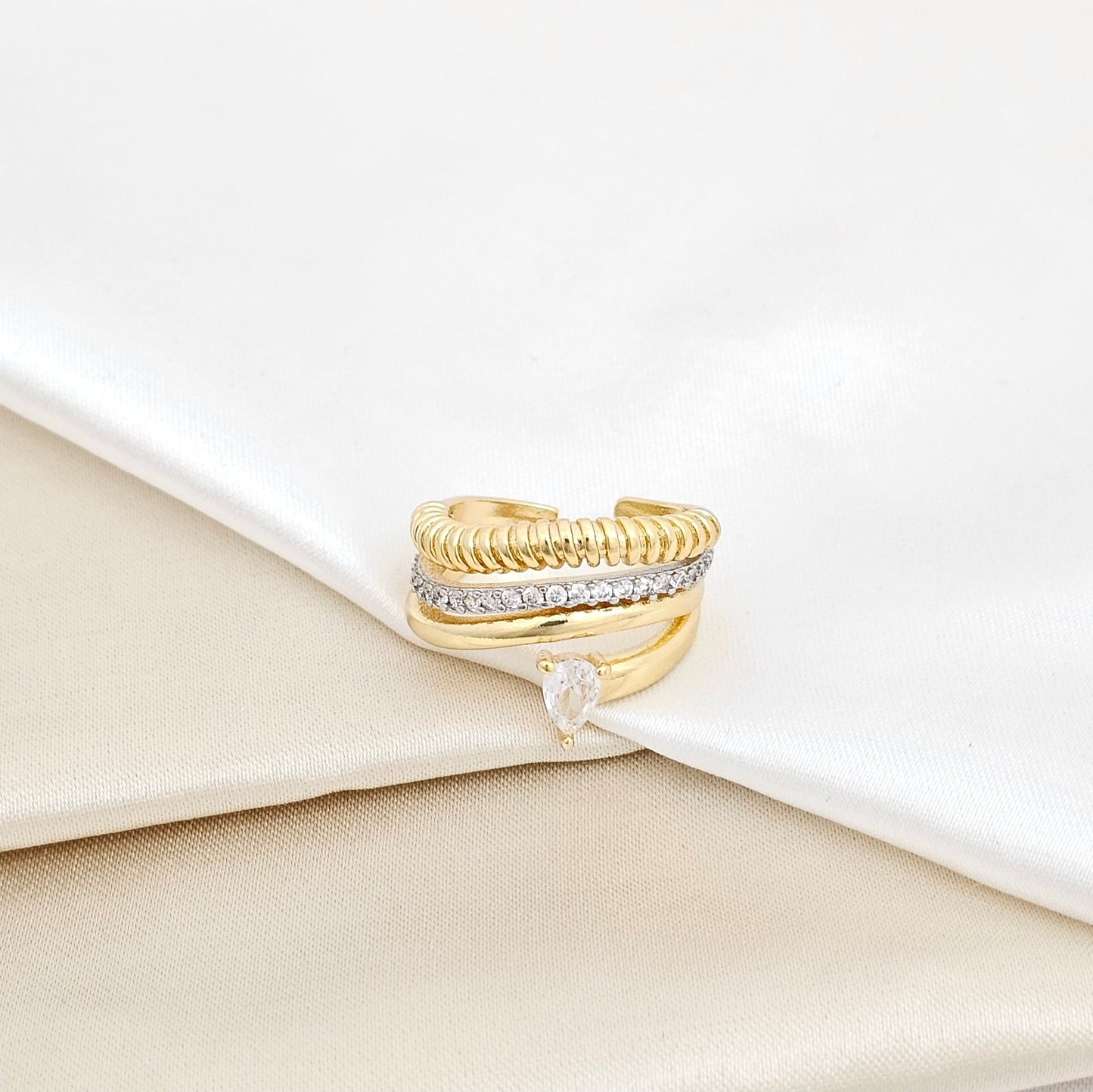 ANILLO CUATRO LINEAS CON PIEDRA CIRCON DORADO RF K5655