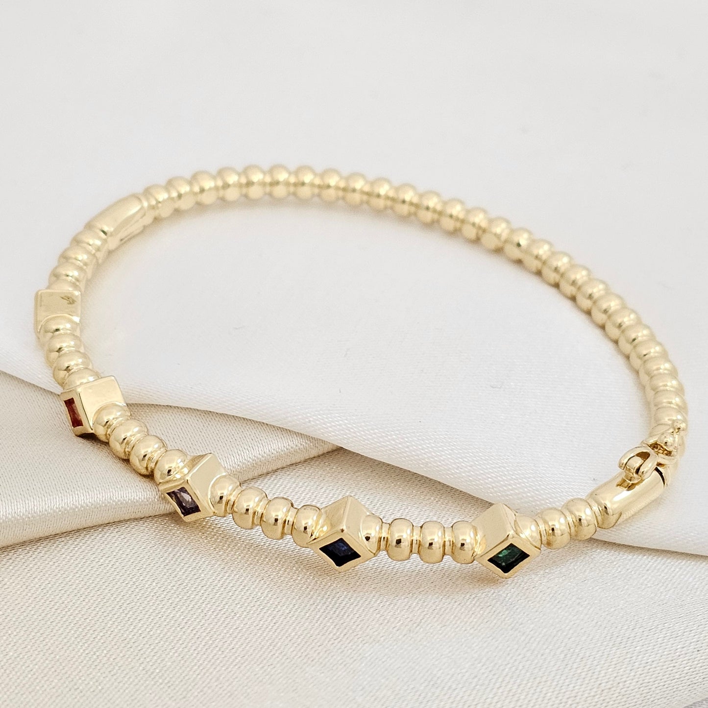 BRAZALETE CINCO ROMBOS DORADO CIRCONES DE COLORES RF K7161