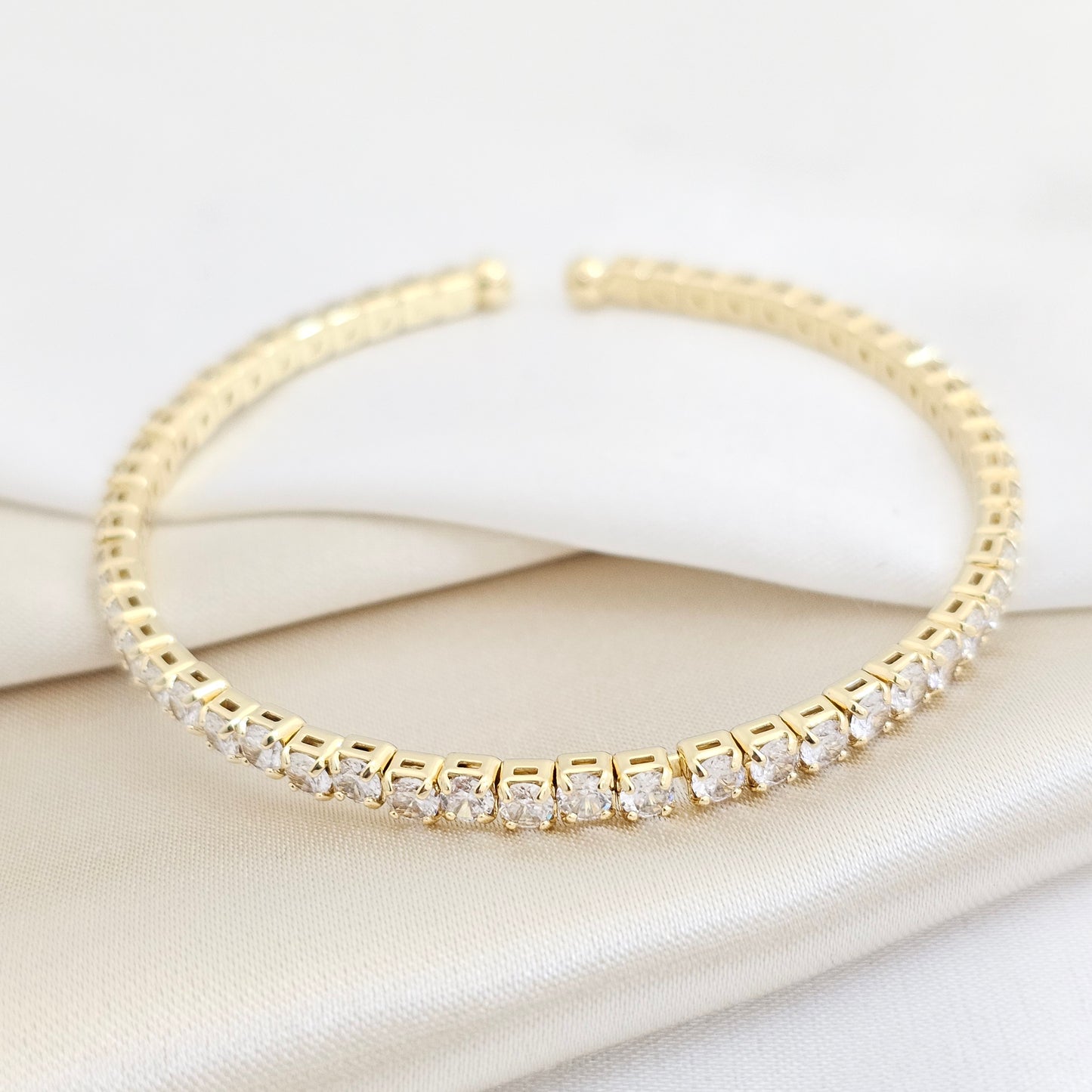 BRAZALETE AJUSTABLE DORADO CIRCONES MEDIANOS RF K7704