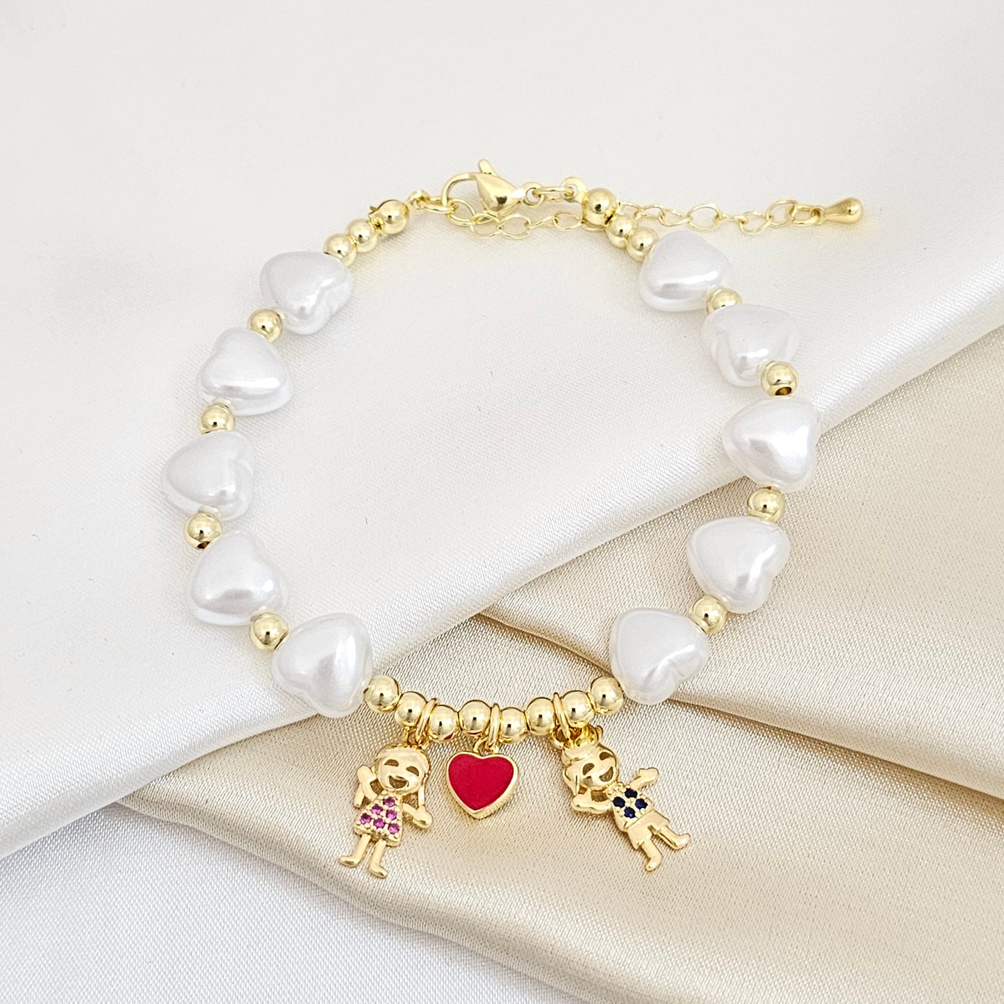 PULSERA CORAZONES DE PERLA DIJES NIÑO Y NIÑA DORADO RF K5605