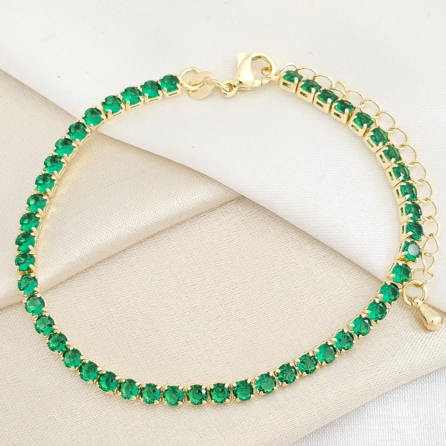 PULSERA CIRCONES VERDES CON EXTENSOR DORADO RF K7759
