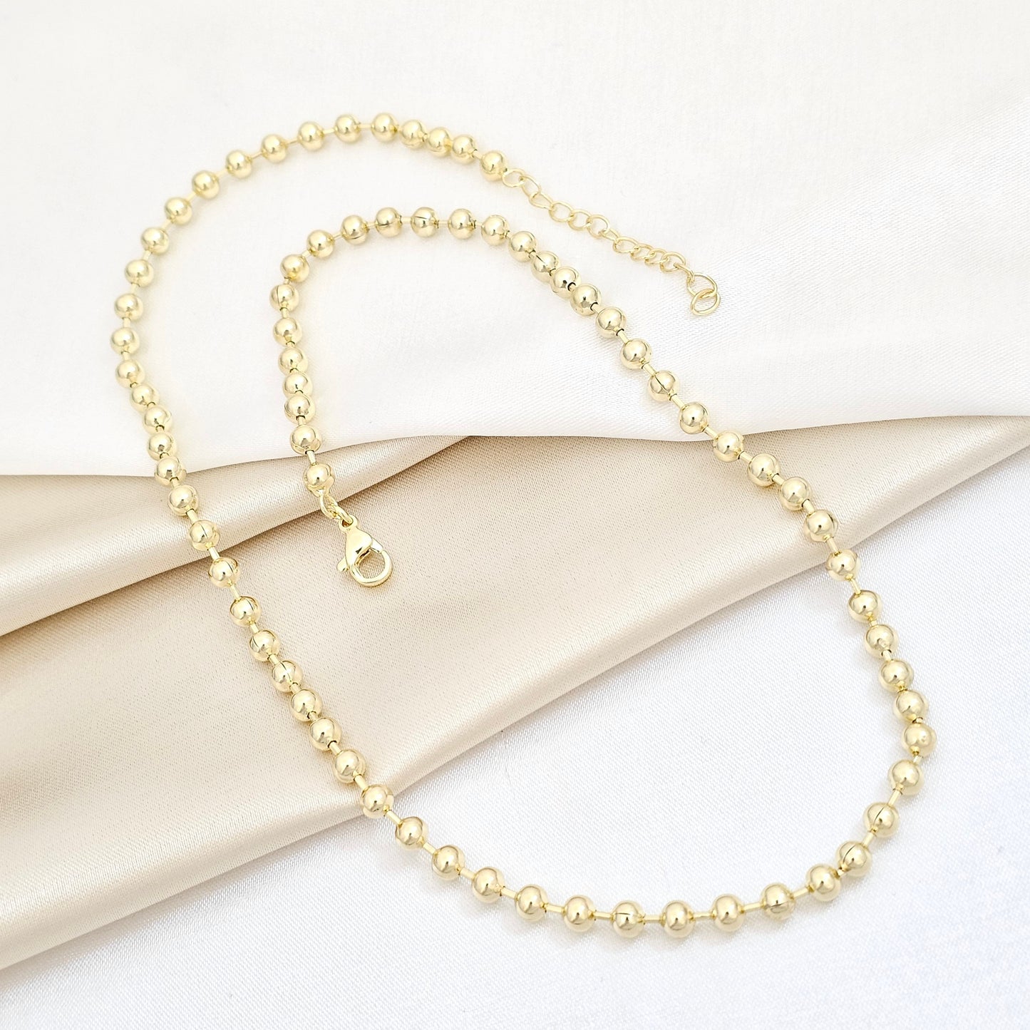 CADENA BALINES N4 SEPARADOR CON EXTENSOR DORADO RF K5754