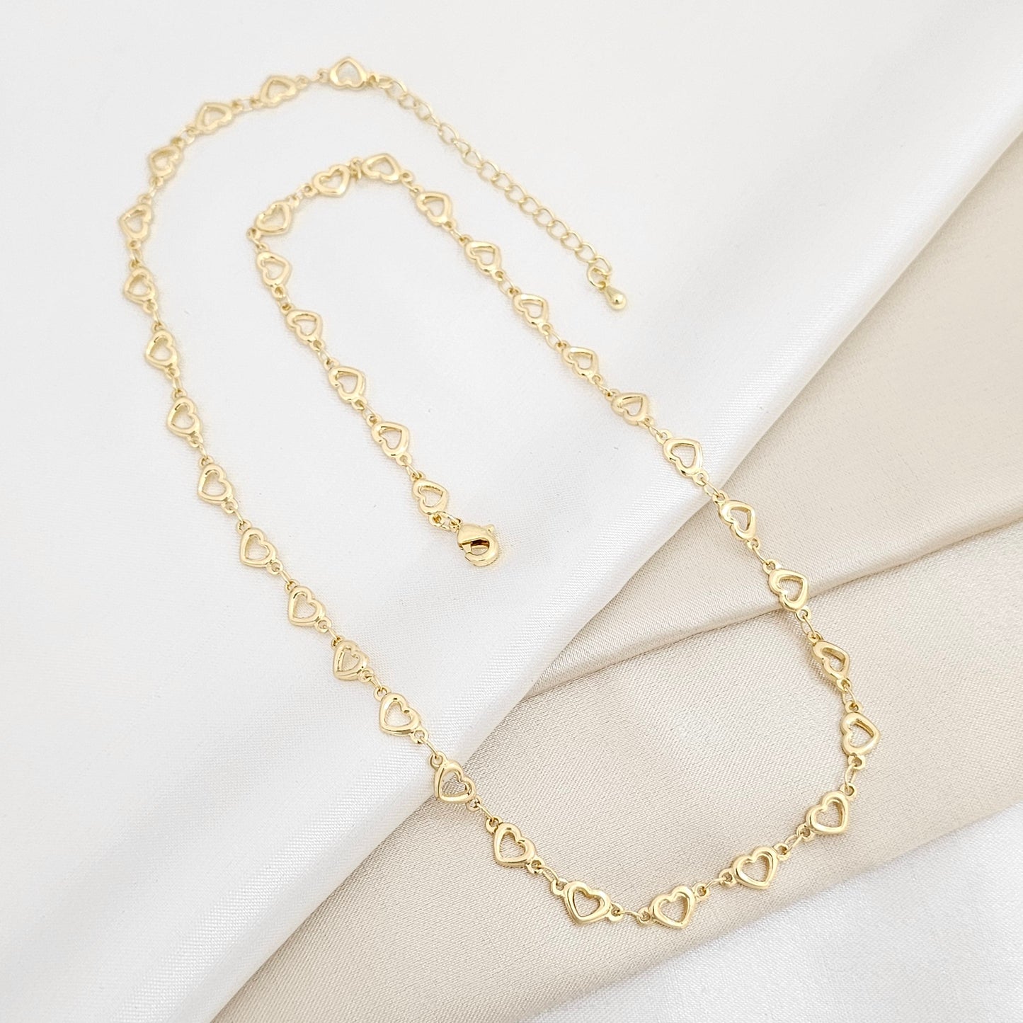 CADENA MINI CORAZONES DORADO CON EXTENSOR RF K6408