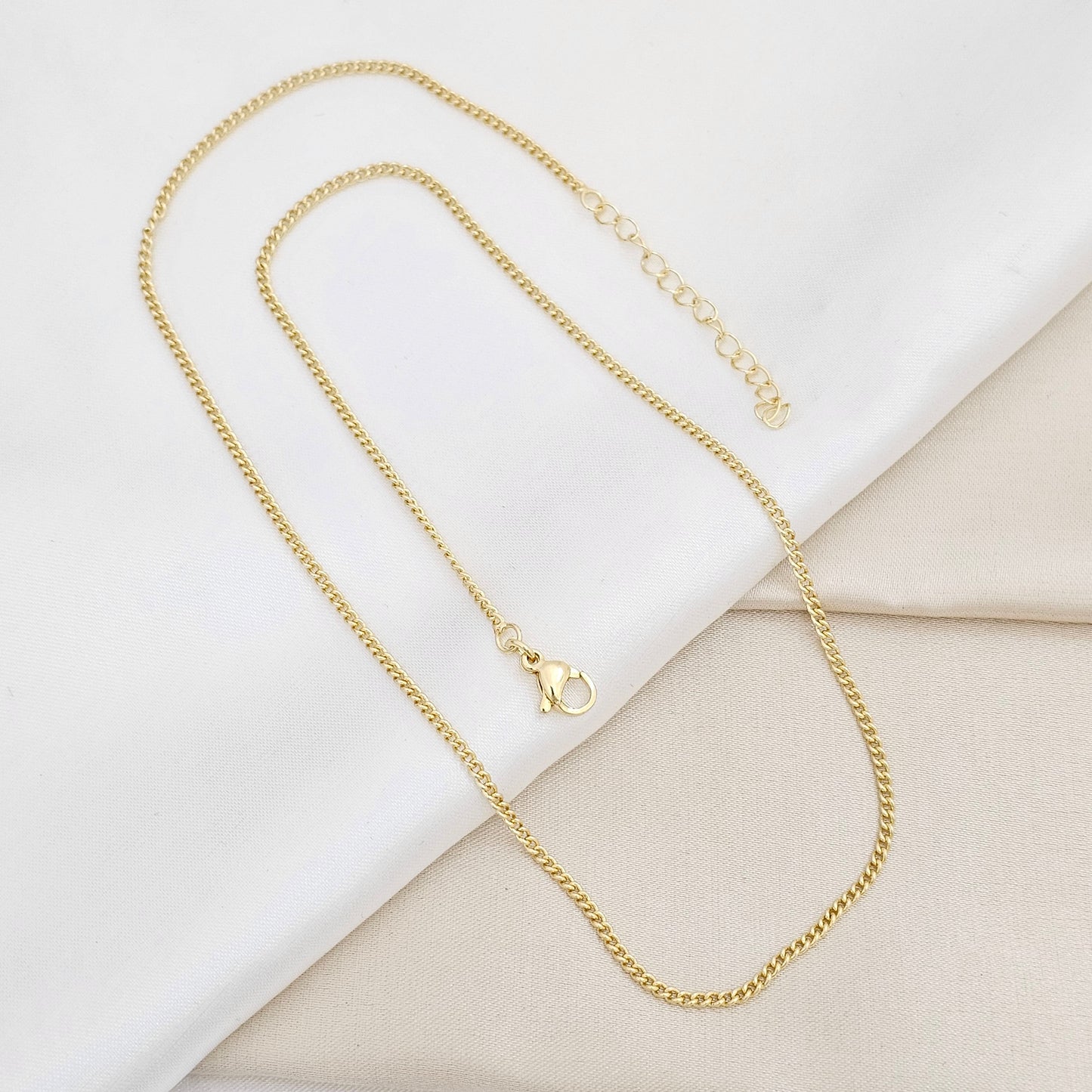 CADENA CUBANA DELGADA 2MM EXTENSOR DORADO RF K6659