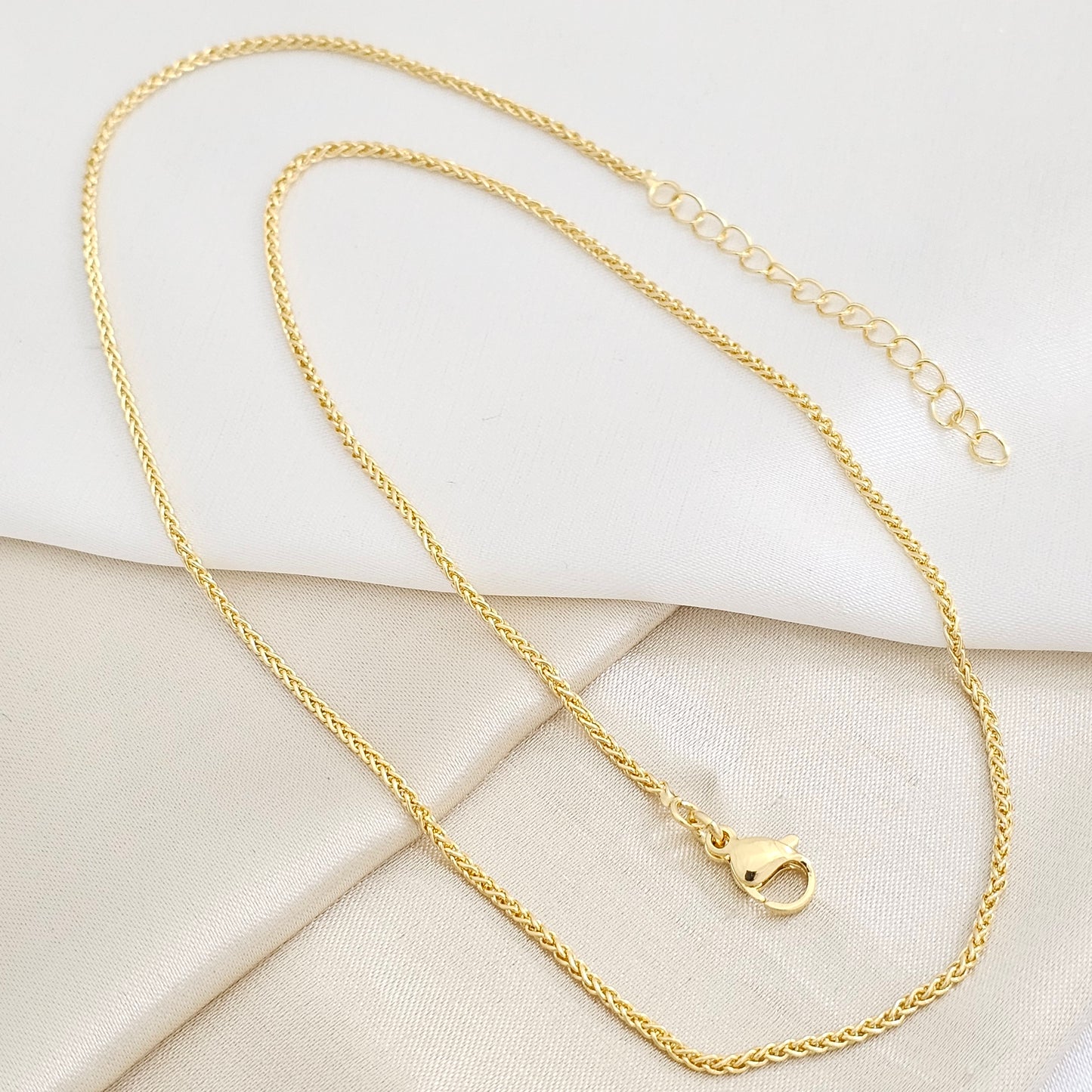 CADENA TRENZADA 49CM CON EXTENSOR DORADO RF K7788