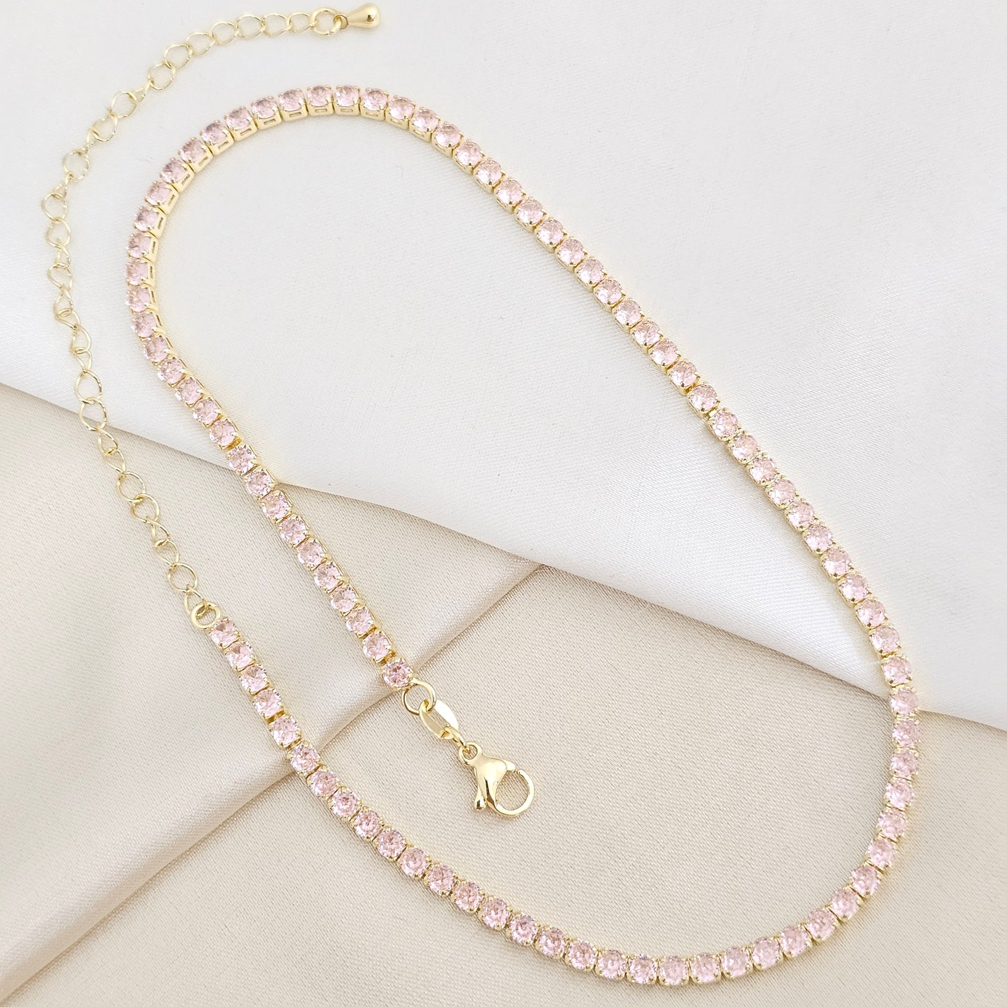GARGANTILLA CIRCONES ROSADO CON EXTENSOR DORADO RF K7855