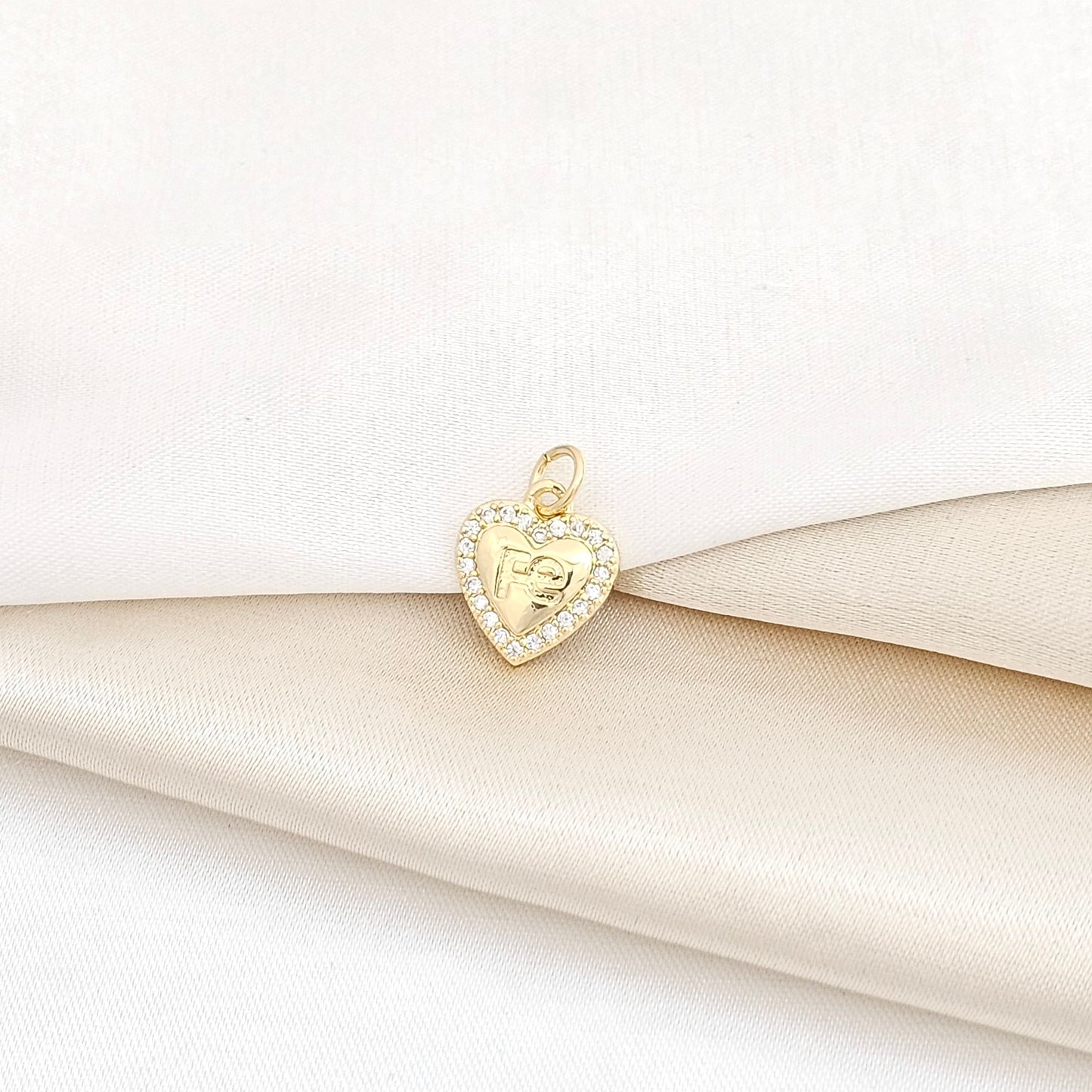 DIJE MINI CORAZON CON PALABRA FE DORADO RF K5731