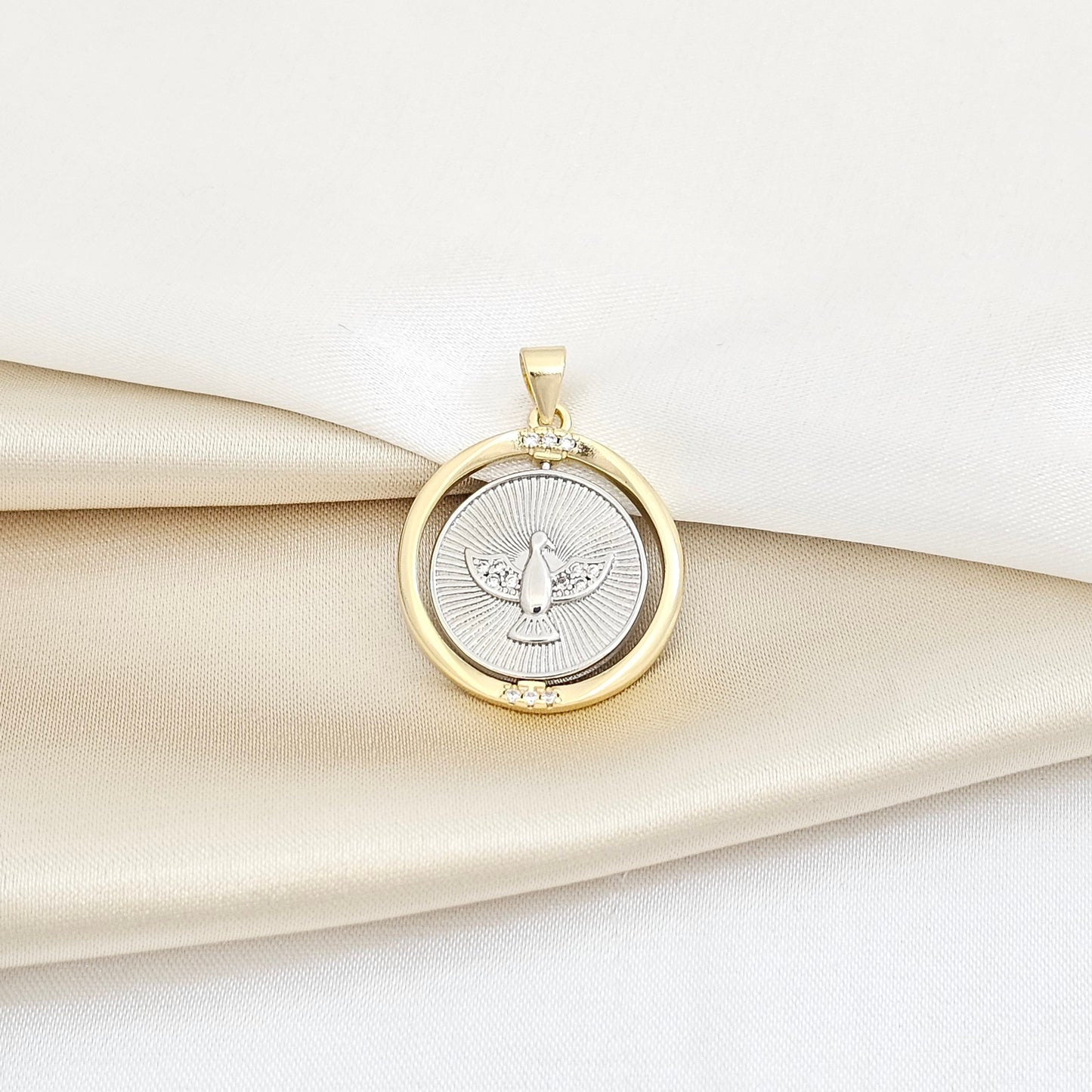 DIJE ESPIRITU SANTO GIRATORIO PLATEADO Y DORADO RF K5770