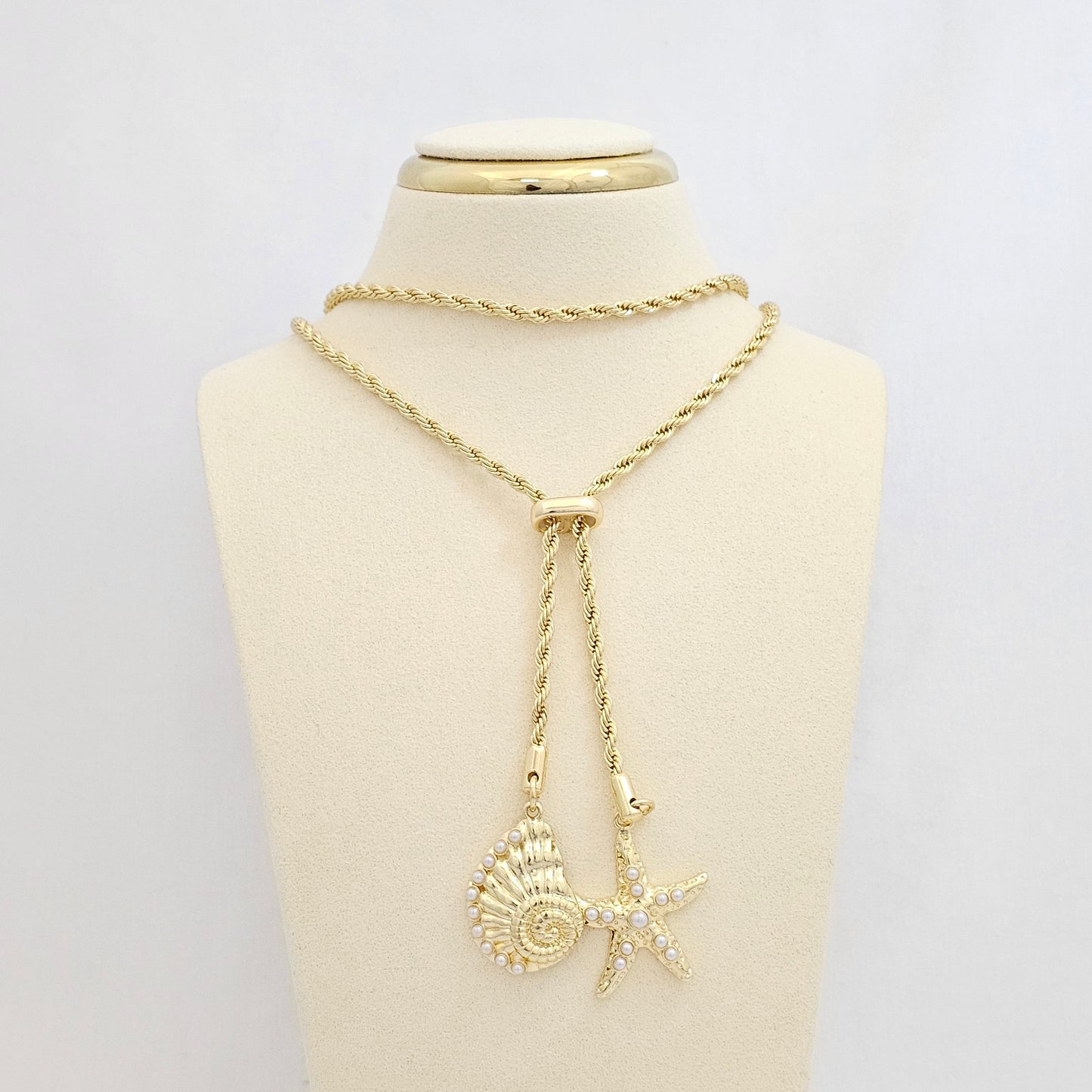 COLLAR LAZO CORREDIZO DIJES CARACOL Y ESTRELLA DORADO RF K6924