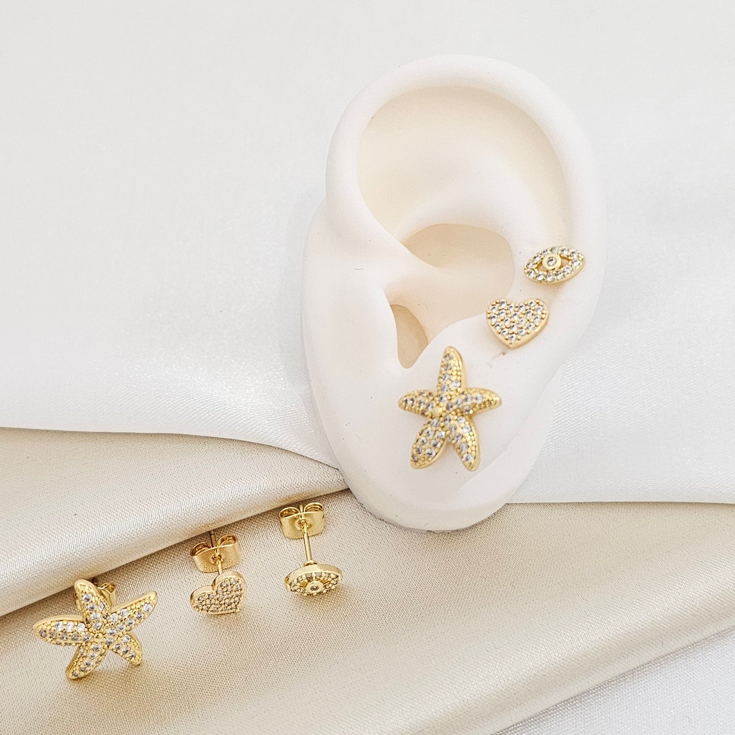 SET TRES TOPOS OJO CORAZON Y ESTRELLA CIRCONES DORADO RF K7251