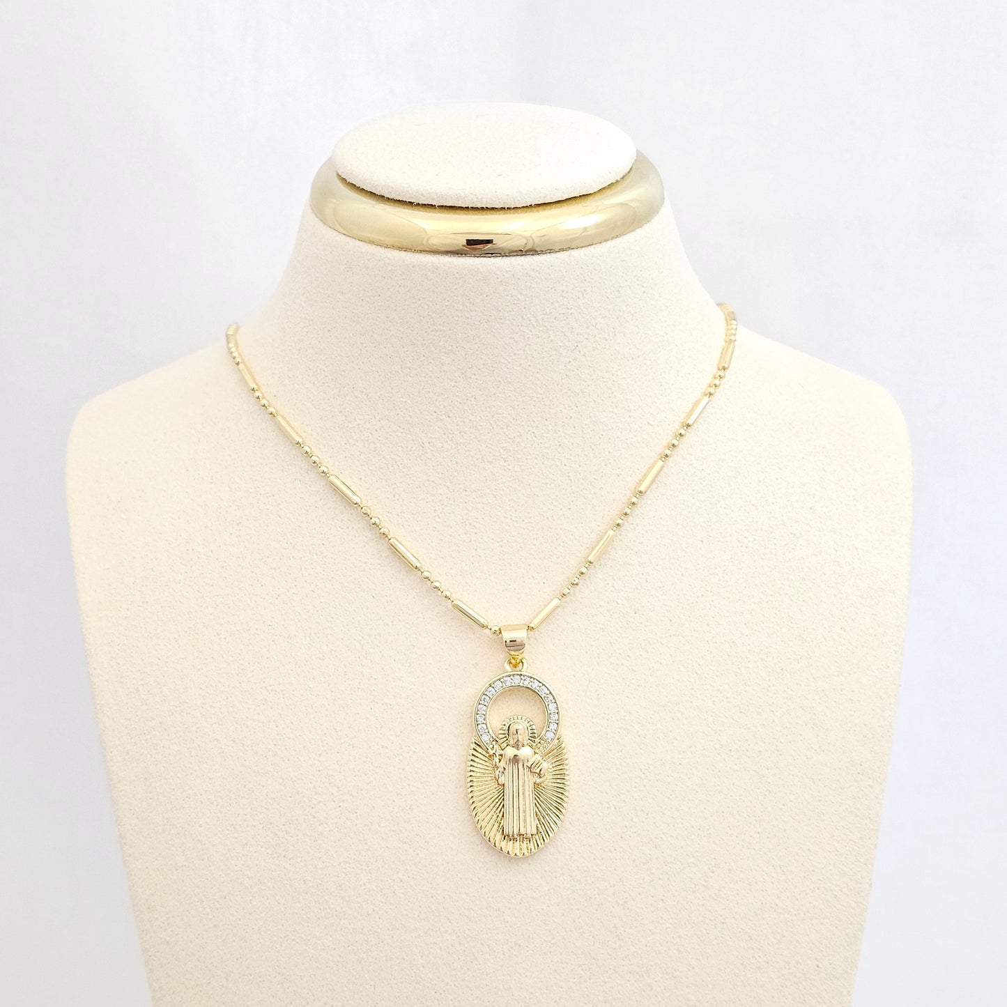 DIJE MEDALLA SAN BENITO CIRCONES DORADO RF K6463