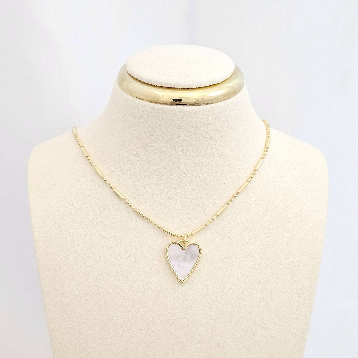 DIJE CORAZON NACAR CON DORADO RF K6476
