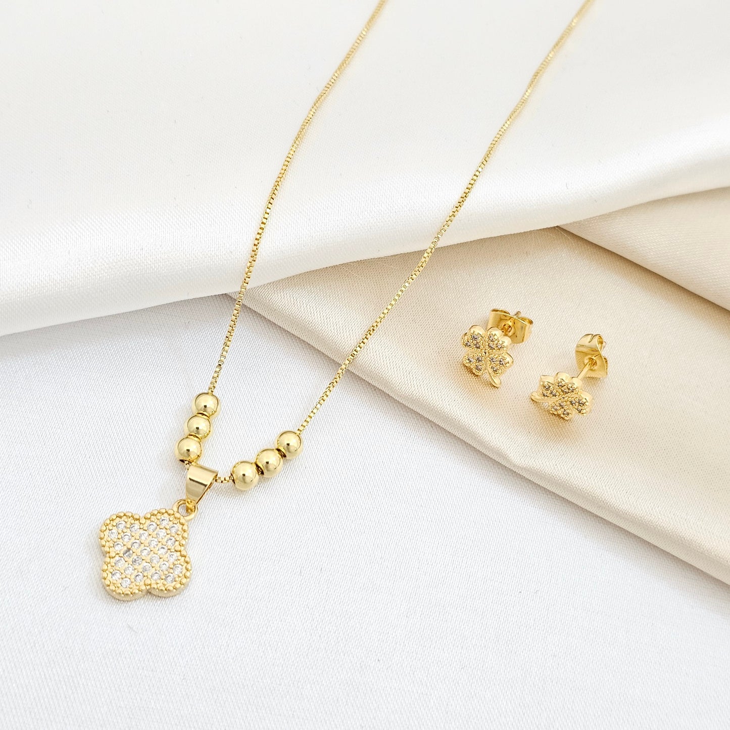 SET CADENA Y TOPO TREBOL PEQUEÑO CIRCONES DORADO RF K6265