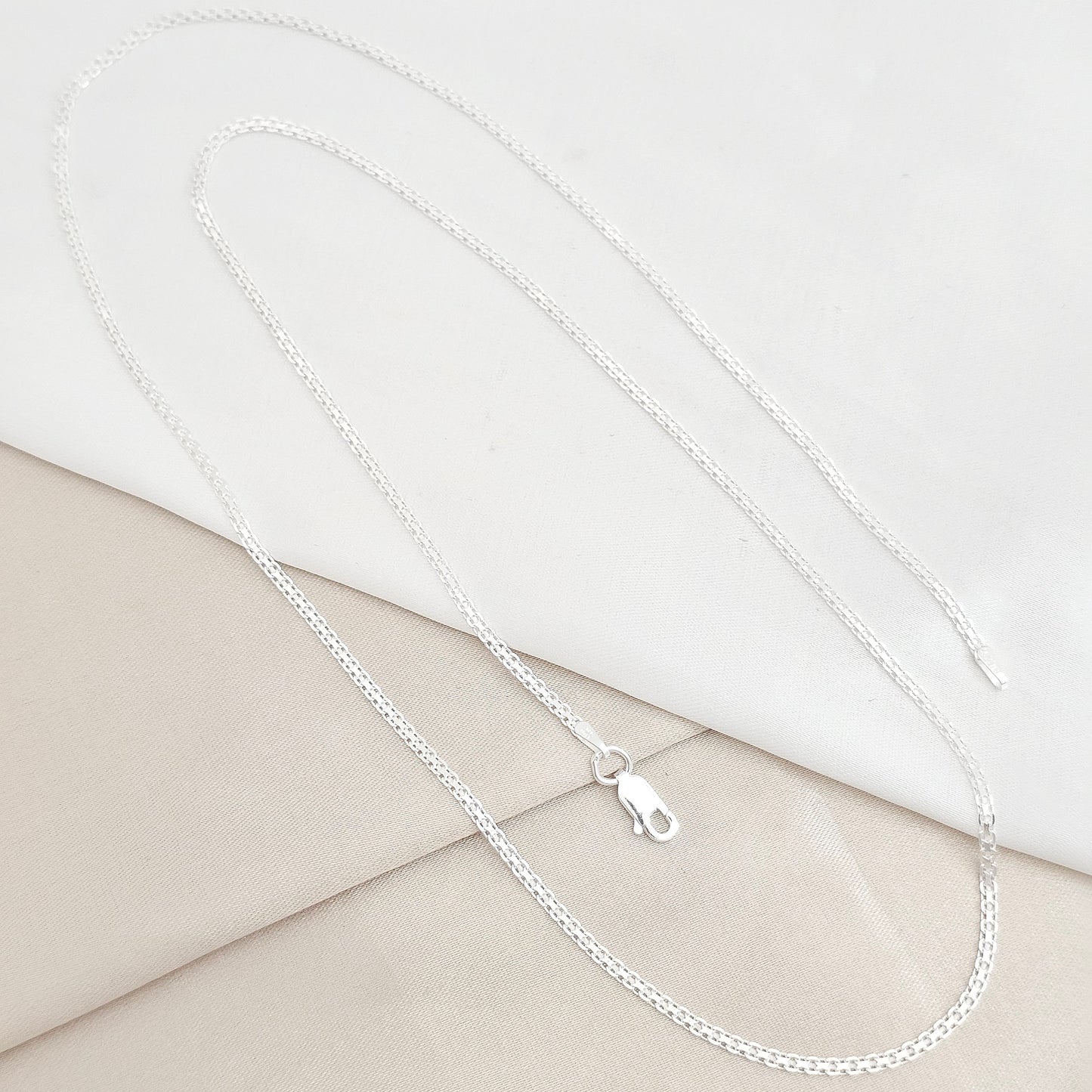 CADENA CHINA 2MM 65CMS PLATA B/S/46883/CONT