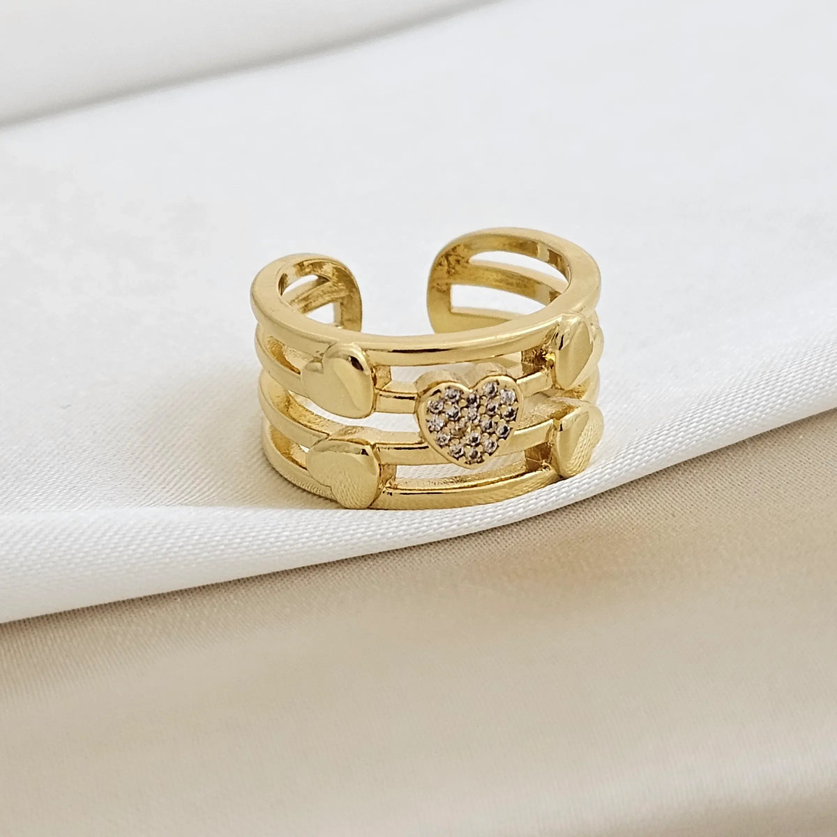 Anillo Lineas Corazones Pequeños Dorado Rf K3272