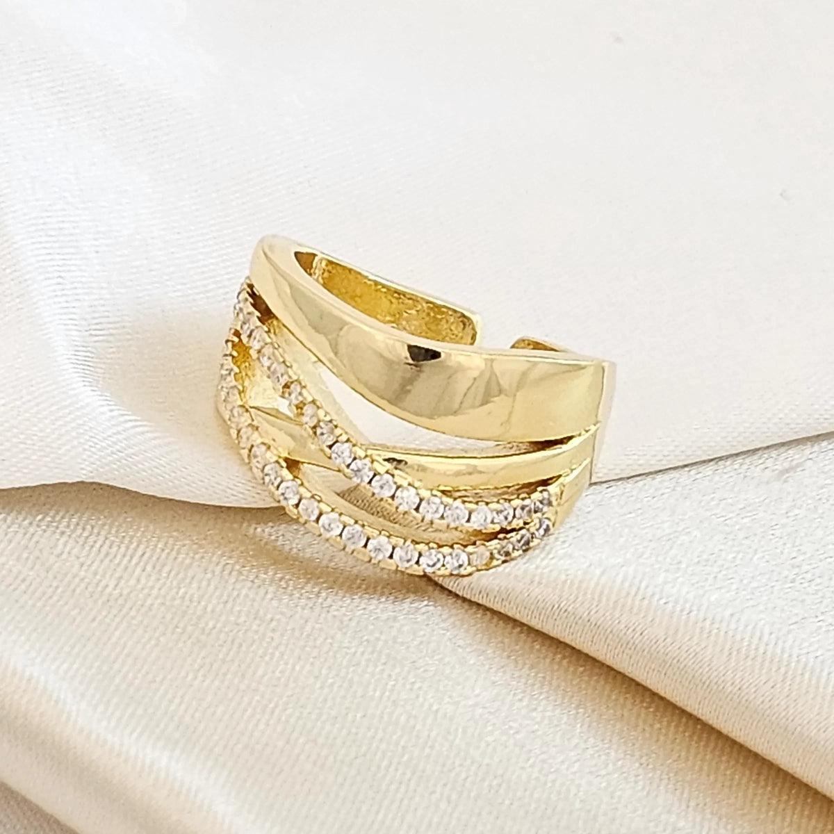 Anillo Lineas Enlazadas Circones Dorado Rf K4335