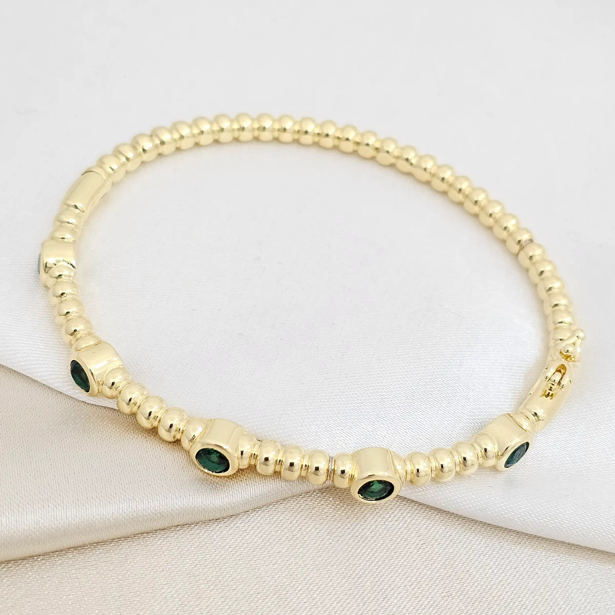 Brazalete Cinco Circulos Dorado Circones Verdes Rf K7168