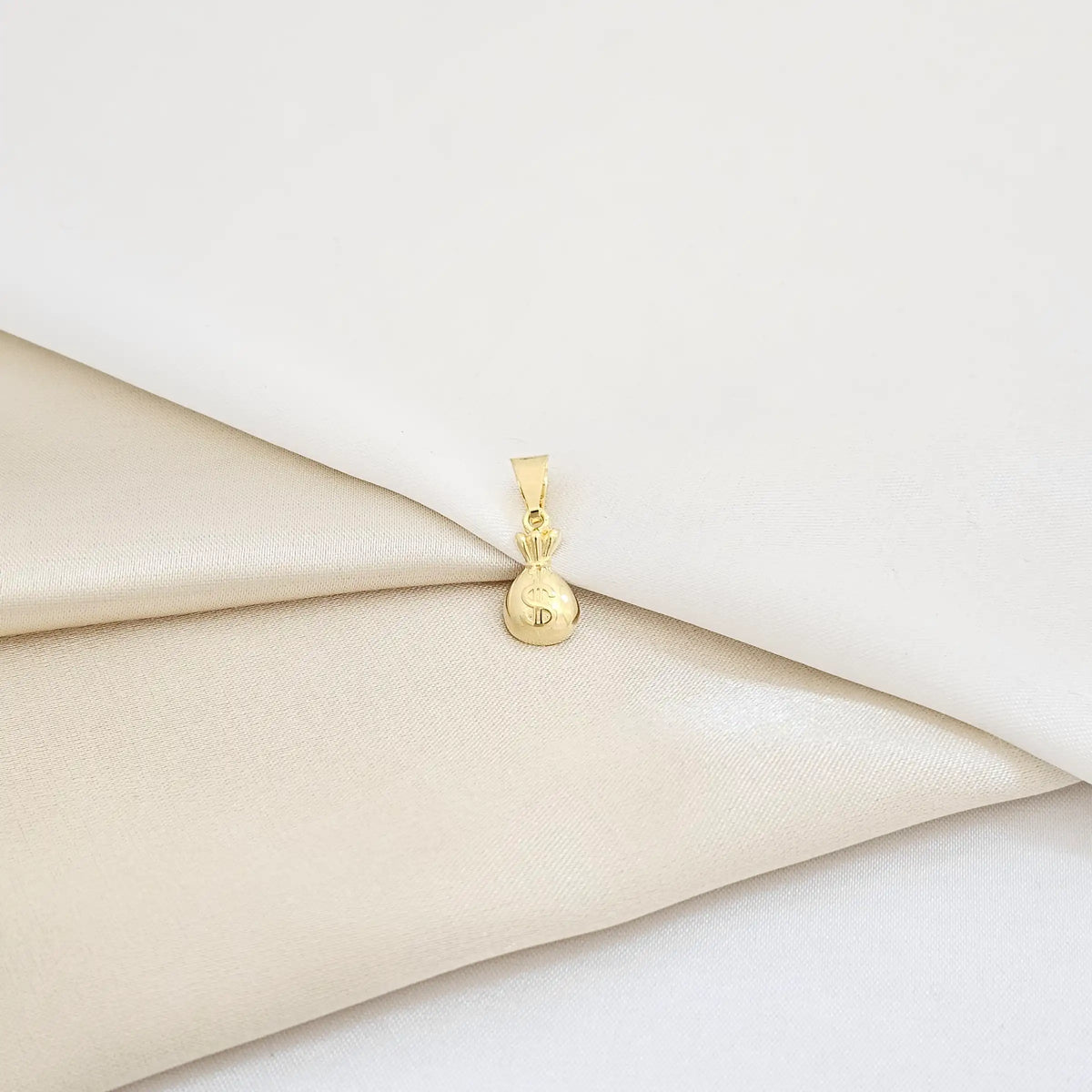 Dije Bolsa De Dinero Lam 18K B/23122