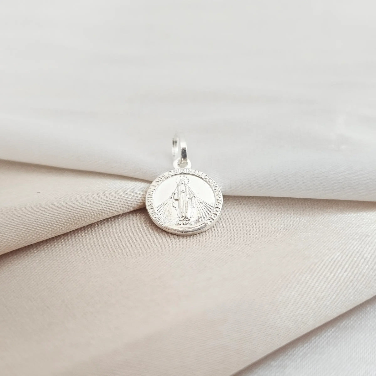 Dije Milagrosa 1.2 Cms Plata B/S/25002/Cont