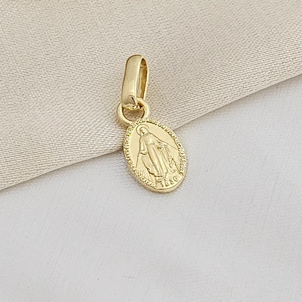 Dije Milagrosa 12 Mm Lam 18K B/20012