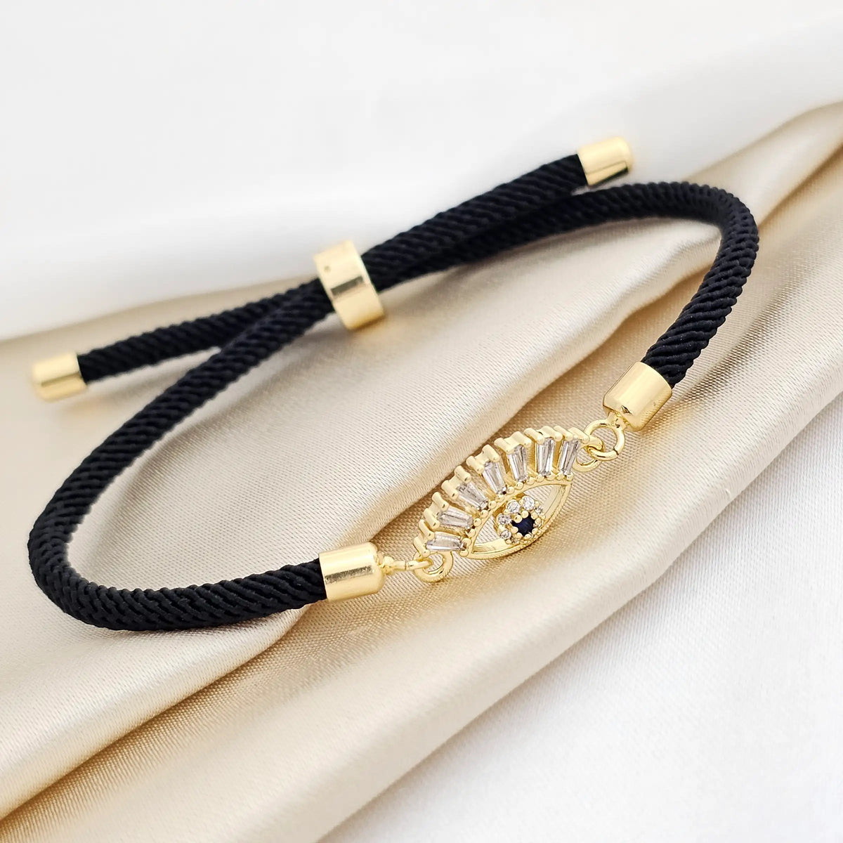 Pulsera Ajustable Negra Herraje Ojo Circon Dorada Rf K3157