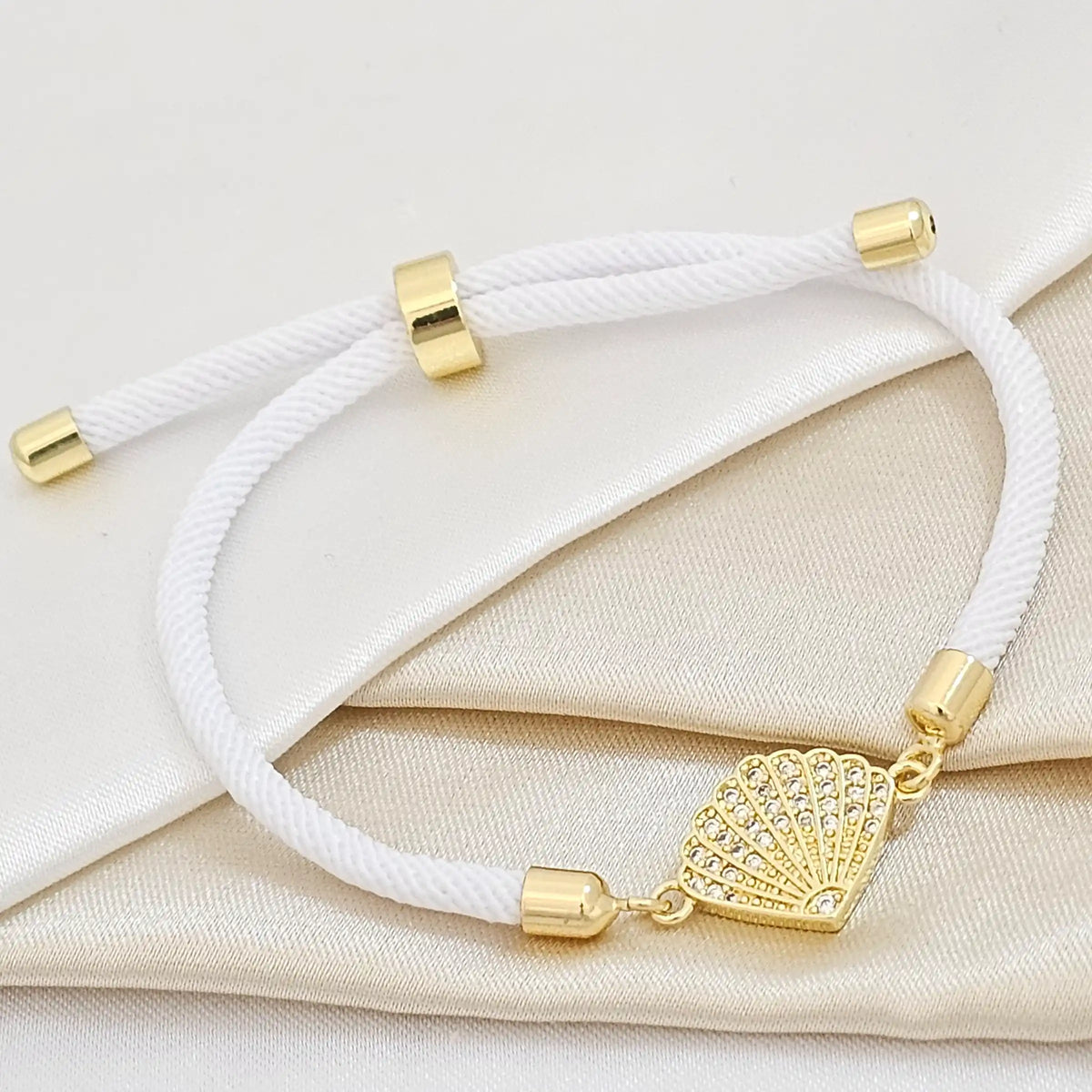Pulsera Blanc Ajustable C / Herraje Paracaida Dorad