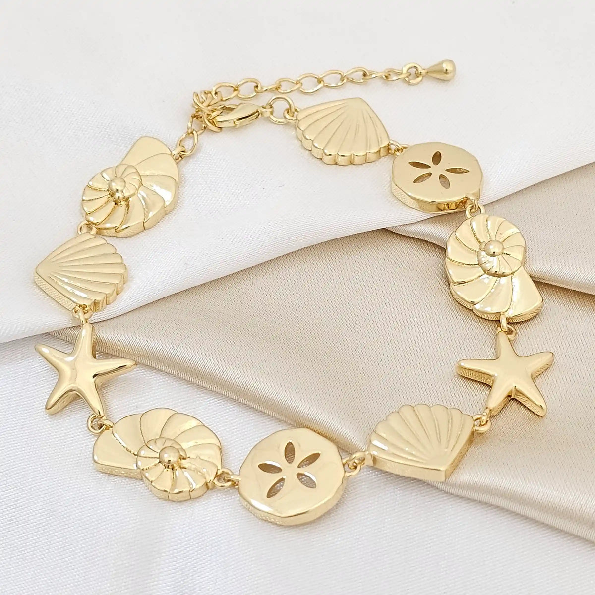 Pulsera Concha Caracol Y Estrella Dorado Extensor Rf K5437