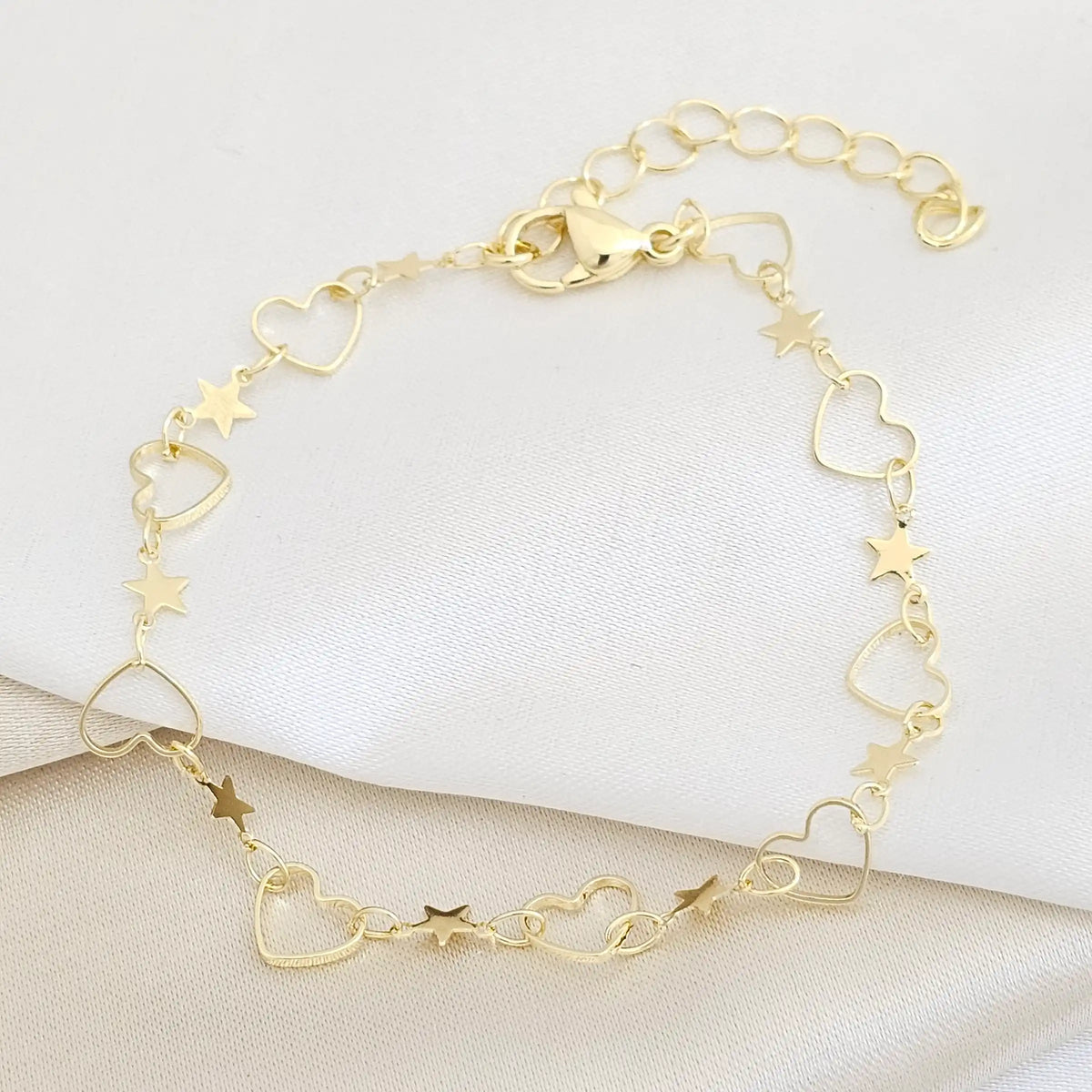 Pulsera Corazones Y Estrellas Con Extensor Dorado Rf K7691