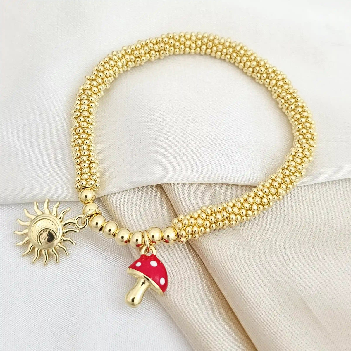 Pulsera Flexible Dorado Dije Sol Y Hongo Rojo Rf K5299