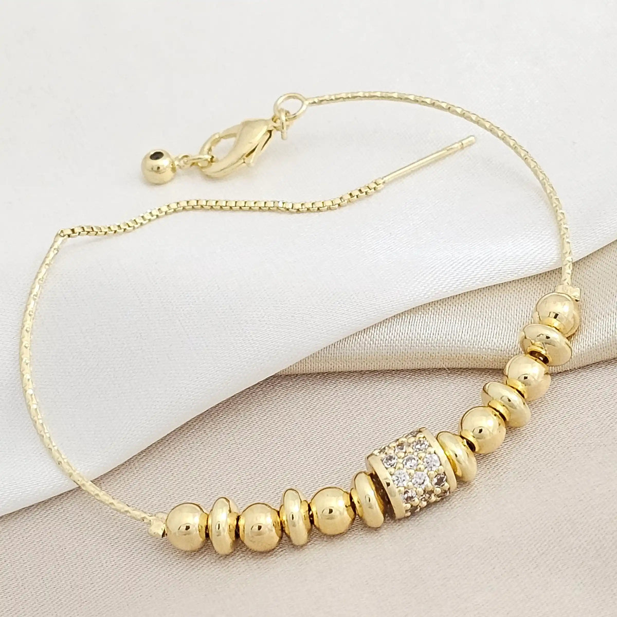 Pulsera H.Tubo Circonias Balines #5 Punto Aguja Dorado Rf K8282