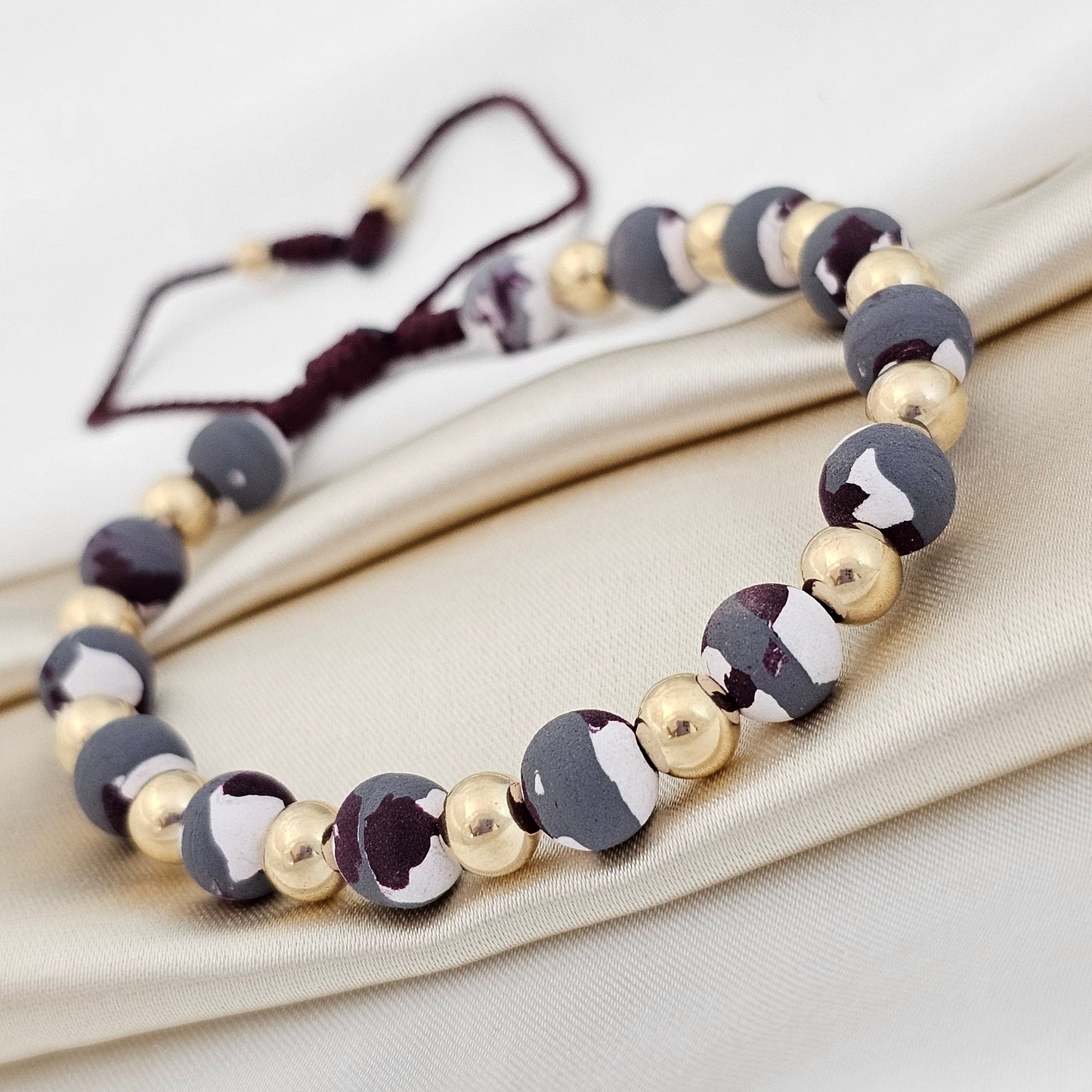 PULSERA GOLD NEOPRENO LISO CAM. #6 VINO TINTO