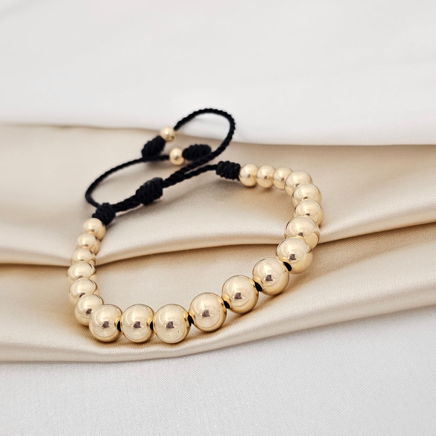 PULSERA GOLD # 5-6-7-8 NEGRA