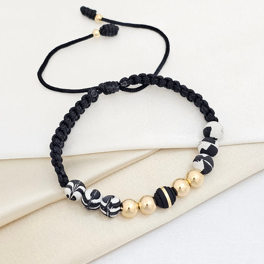 PULSERA GOLD # 7 NEOPR GOLD NEGRO