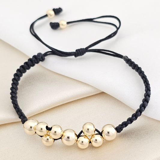 PULSERA GOLD CRUZADA # 4,5,6 NEGRA