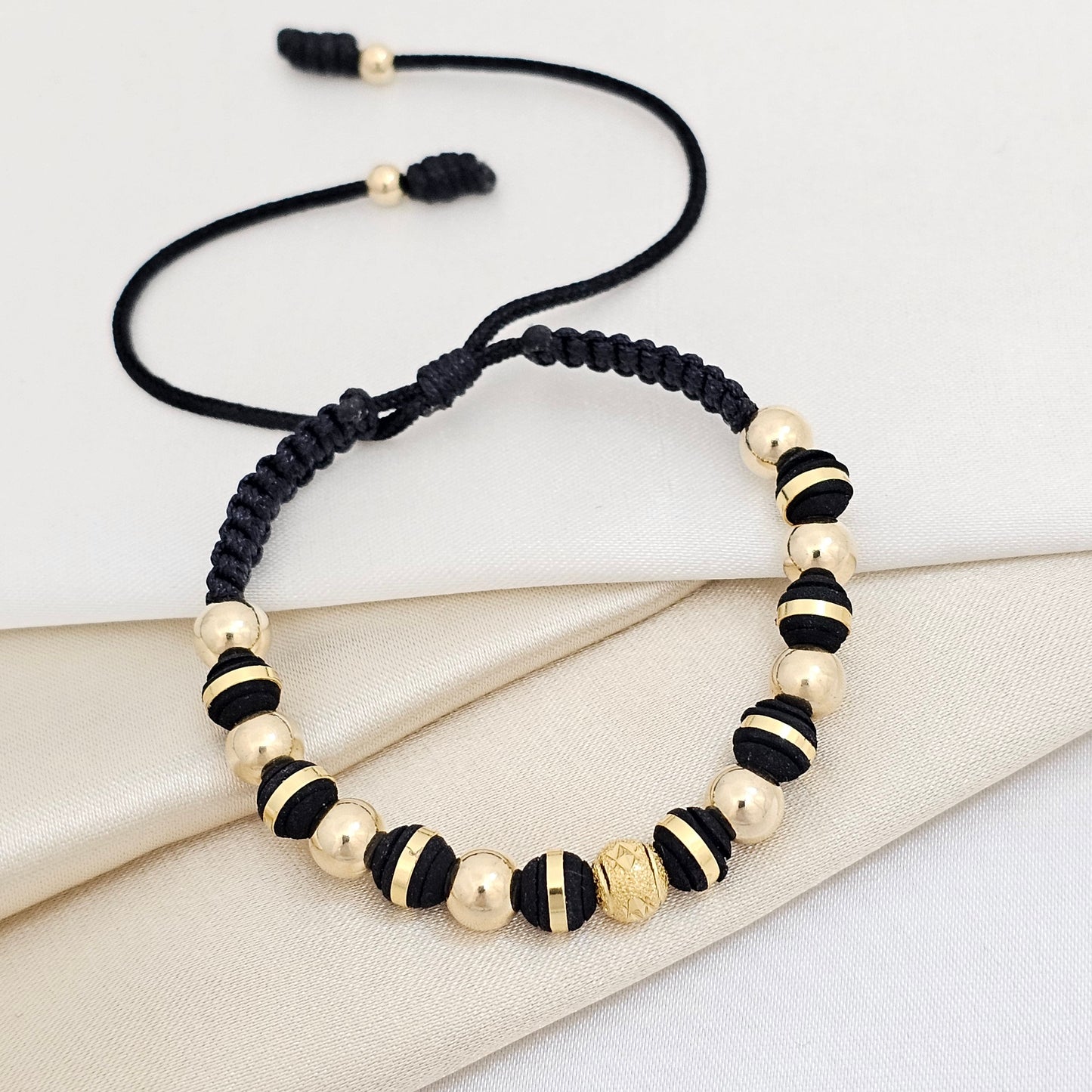 PULSERA GOLD DIAM # 6 DOR # 6 NEOP GOLD NEGRA
