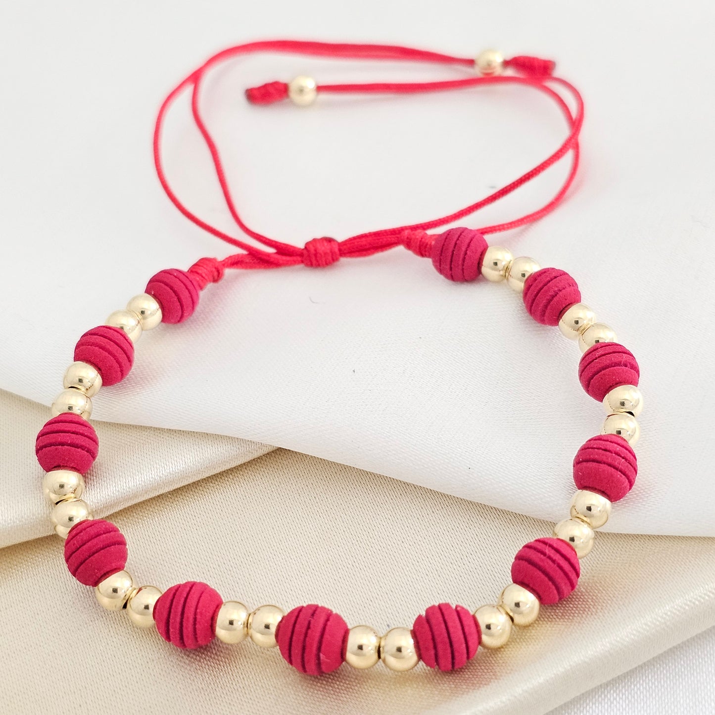 PULSERA GOLD BALIN #4 NEOPRENO RANURADO #6 ROJA