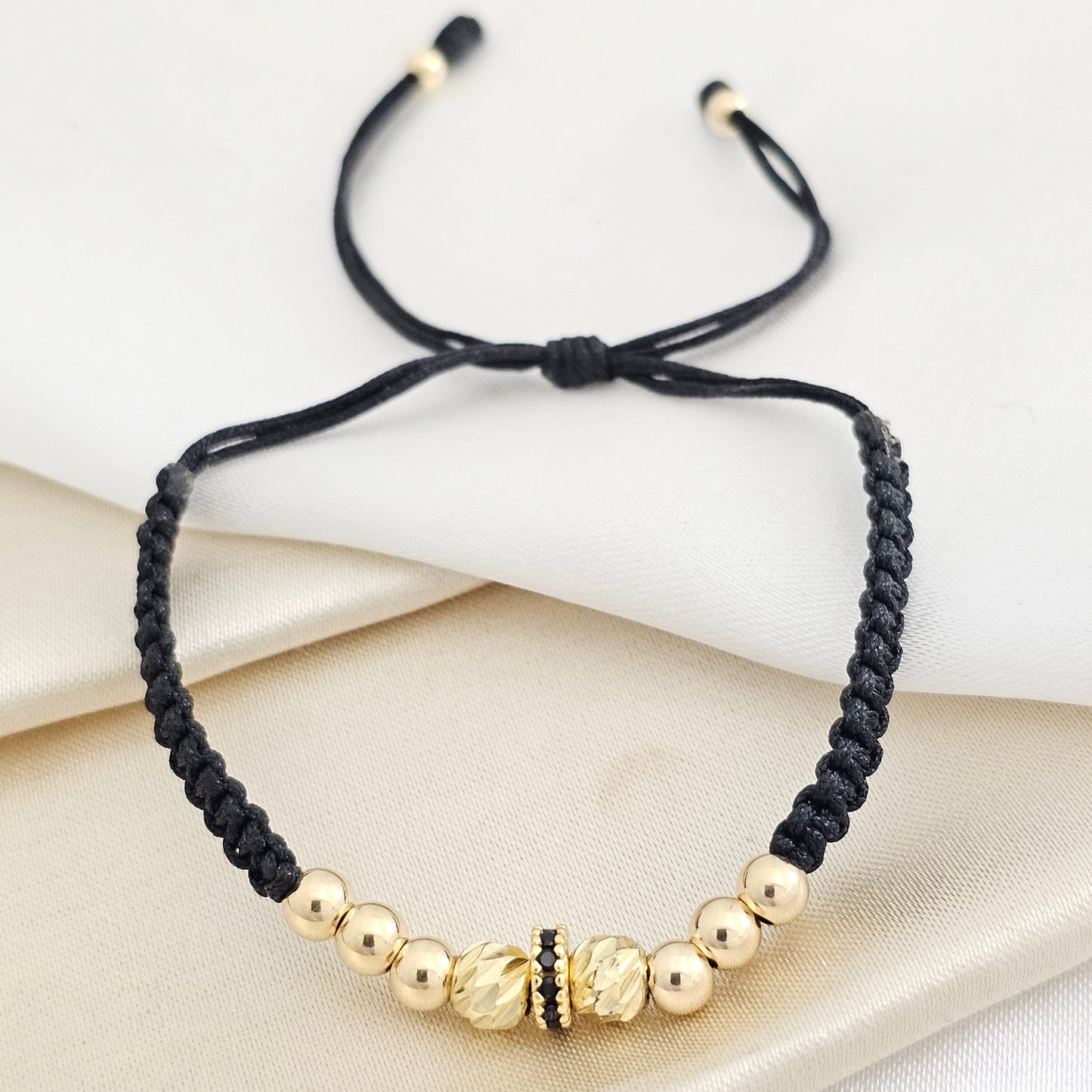 PULSERA GOLD H. RONDEL CIRCONIAS ITALY #5 DORADO #4 NEGRO