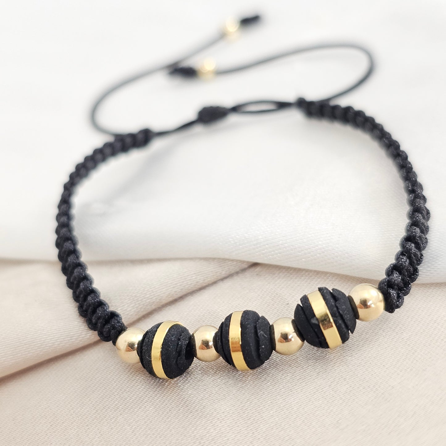 PULSERA GOLD # 4 NEOPRENO GOLD # 6 NEGRA