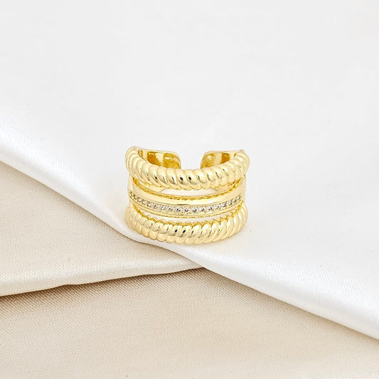 ANILLO TRES LINEAS TRENZADAS Y CIRCONES DORADO RF K5685
