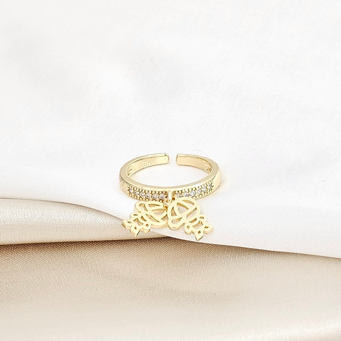 ANILLO CIRCONES CON DIJES NIÑOS DORADO RF K5762