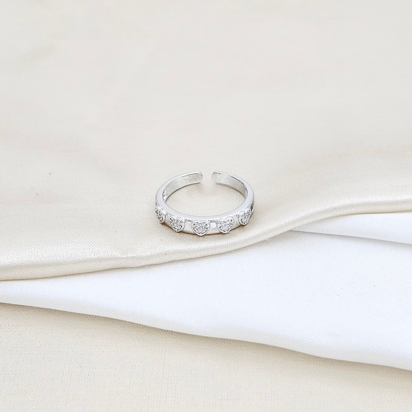 ANILLO CINCO CORAZONES CON CIRCONES PLATEADO RF K5813