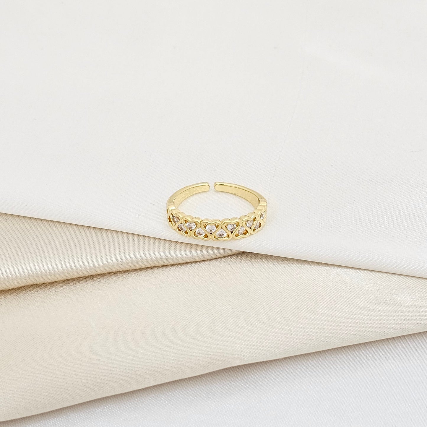 ANILLO CORAZONES ENLAZADOS CON CIRCONES DORADO RF K5919