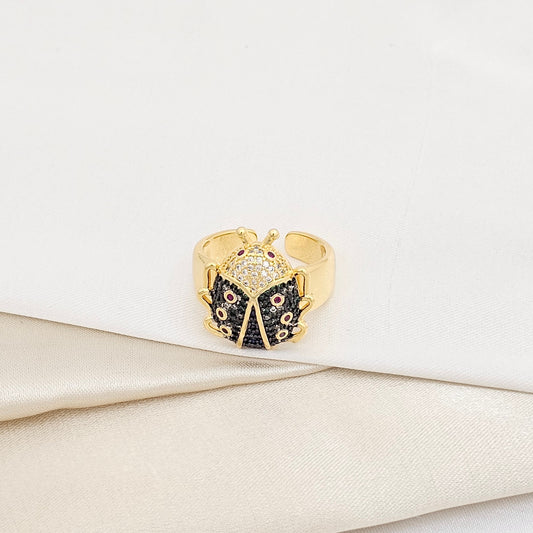 ANILLO DORADO CON MARIQUITA VERDE RF K5935