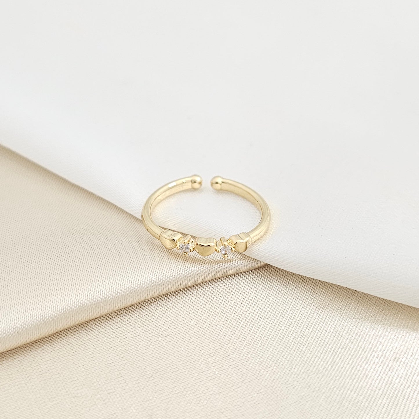 ANILLOS TRES CORAZONES LISOS CON CIRCONES DORADO RF K7746