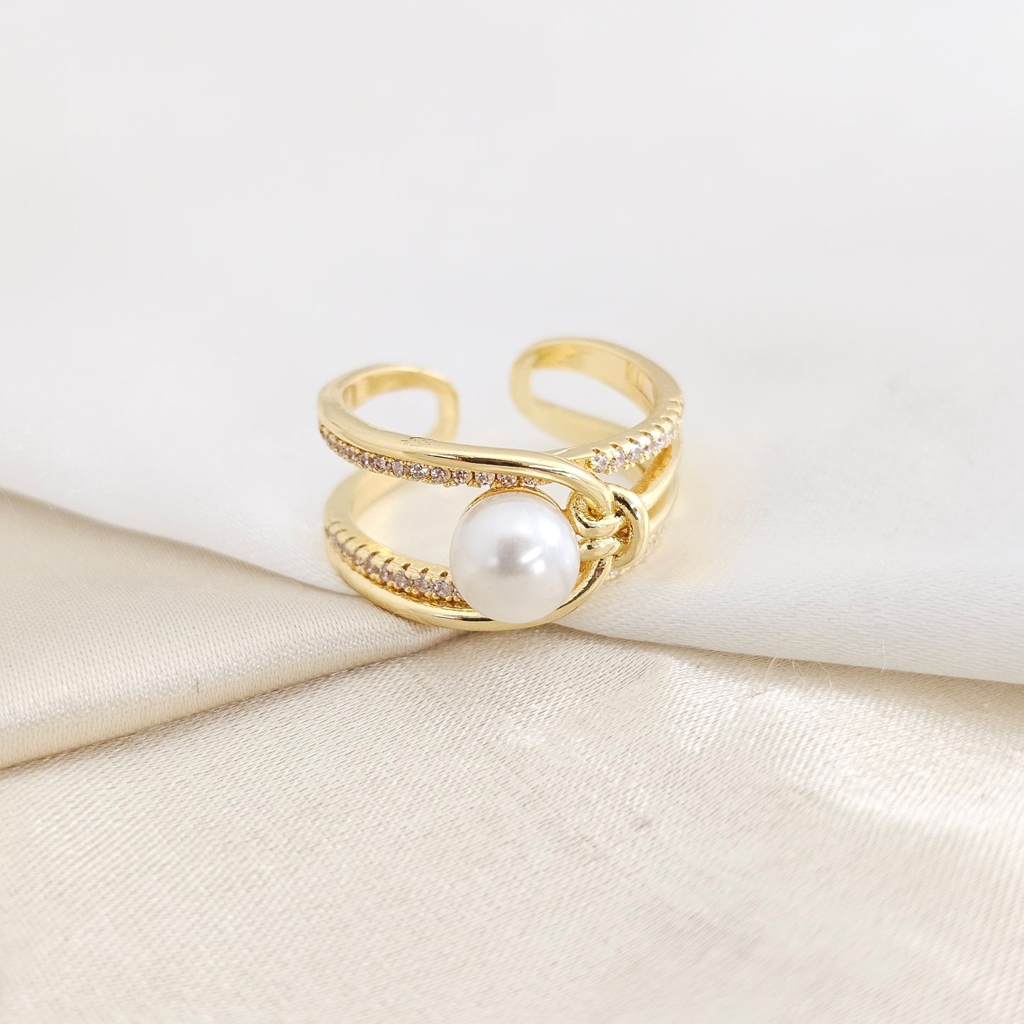 ANILLO NUDO DORADO CON PERLA Y CIRCONES RF K7813